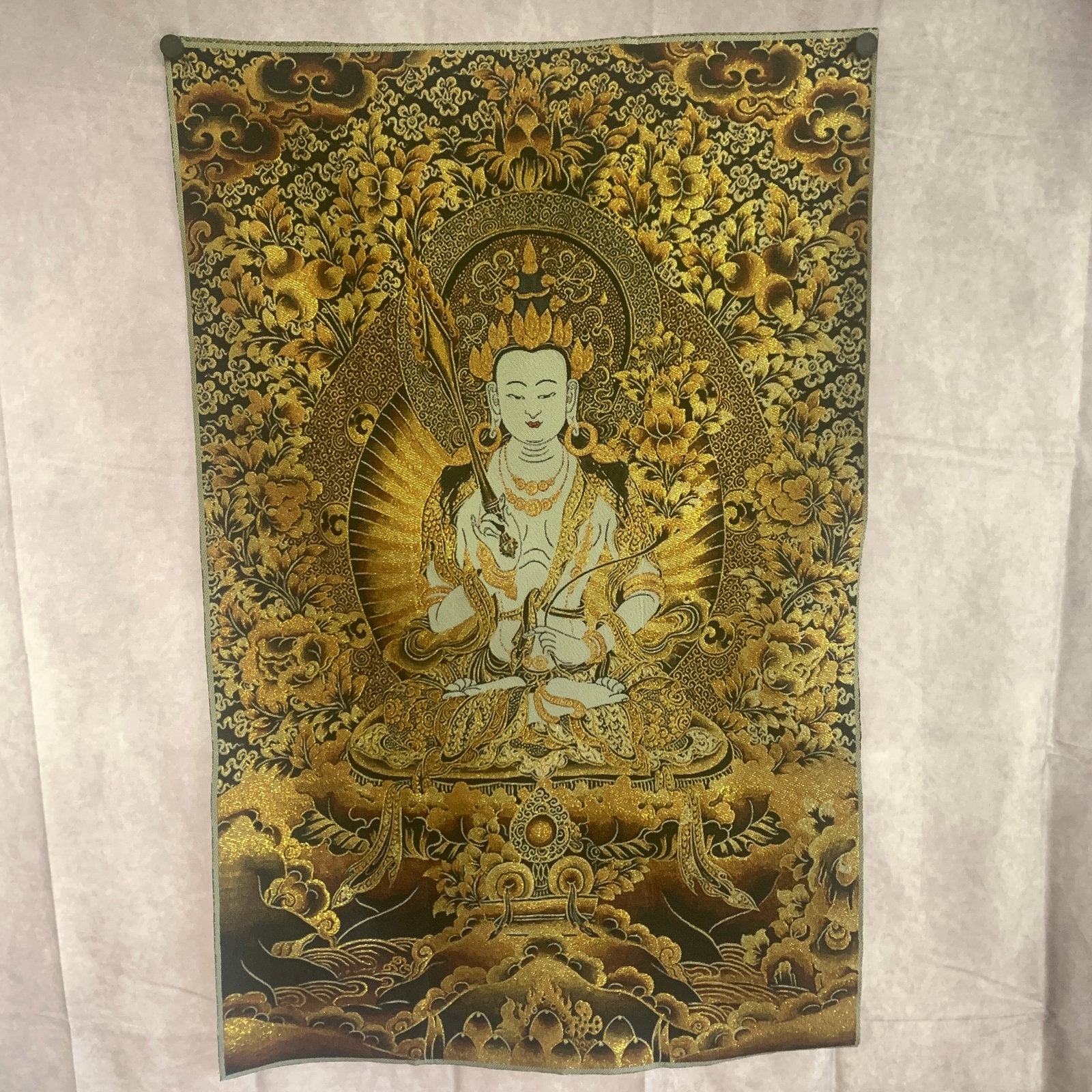 A FINE WOVEN BROCADE SILK THANGKA DEPICTING ?K??AGARBHA
