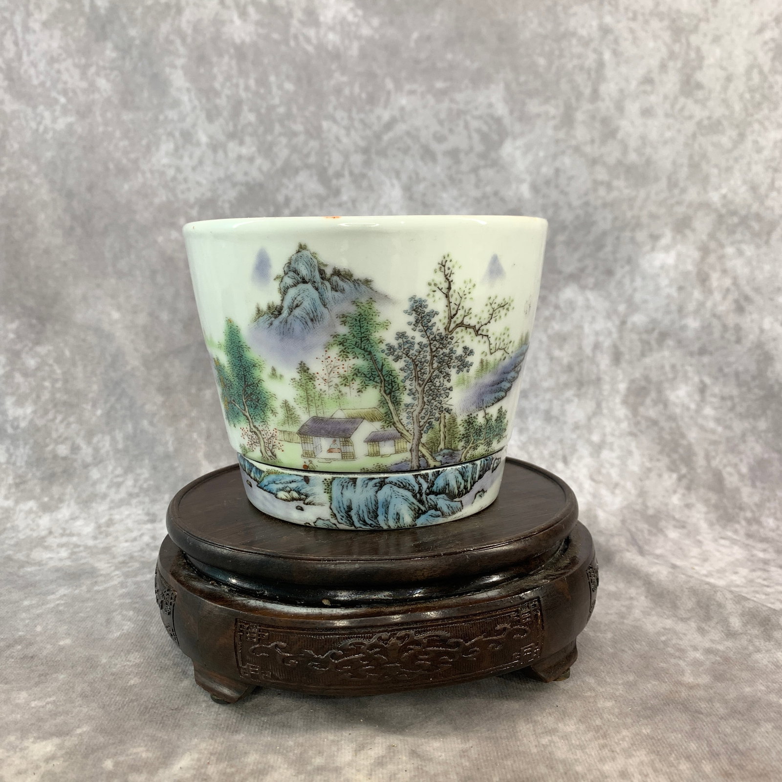 A FAMILLE-VERTE OR FENCAI 'LANDSCAPE' PLANTER AND STAND: Republic Period; High: 4.1 inch; Diameter: 5.3 inch; Wooden base for diplay only