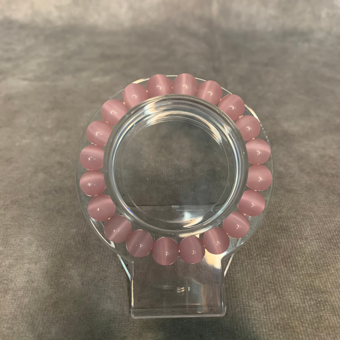 A FINE PINK CRYSTAL MADE BRACELET: Modern, Diameter: 2 inch; Each Bead Diameter: 0.4 inch