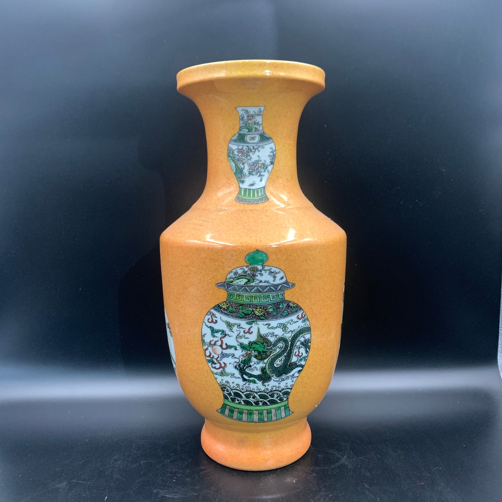 A FINE YELLOW-GROUND "VASE-WITH IN-A-VASE" PORCELAIN VASE: Qing Dynasty; High: 16.8 inch; Diameter: 8.2 inch; Wooden base for diplay only