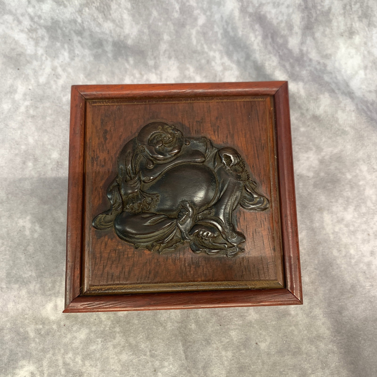 A FINE 'BUDAI' CARVED SQUARE HARDWOOD BOX: Modern; Long: 4.7 inch; Width: 4.7 inch; High: 1.8 inch; Wooden base for diplay only