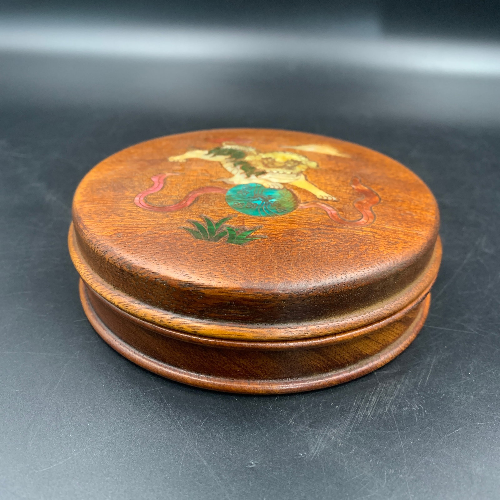 A FINE ROUND HUANGHUALI-STYLE INLAID SEAL BOX: Modern; High: 1.7 inch; Diameter: 5.5 inch; Wooden base for diplay only