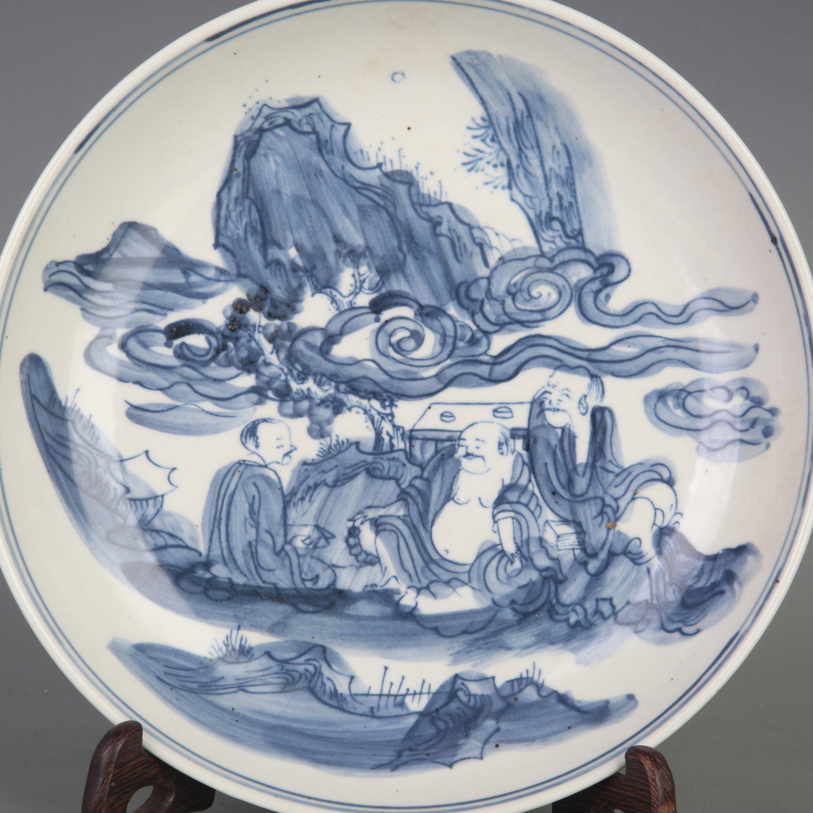 BLUE AND WHITE PLATE WITH HUMAN STORY FIGURES: Ming Dynasty Style; Diameter: 8.3 inch; High: 1.5 inch; Wooden base for diplay only