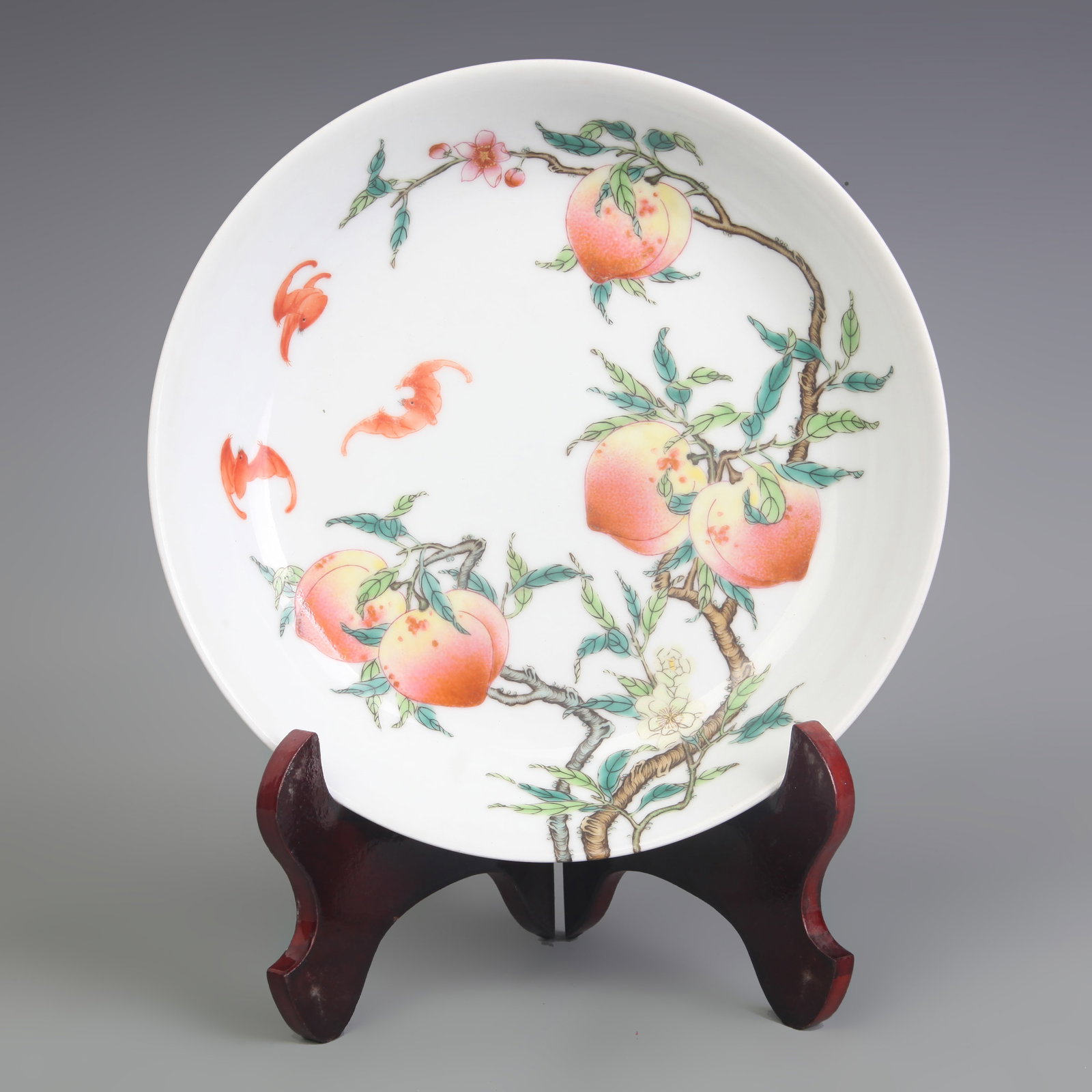 A FAMILLE-ROSE ‘FU AND SHOU’ PATTERN PORCELAIN DISH: Qing Dynasty Yong Zheng Period; Diameter: 8.0 inch; High: 1.8 inch; Wooden base for diplay only