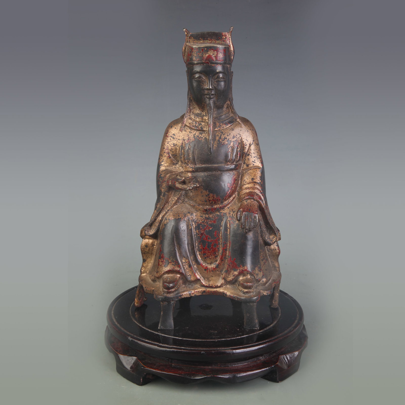 A FINE BRONZE BUDDHA STATUE IN FIGURE OF DAOIST DEITY: Qing Dynasty; Width: 5.0 inch; High: 9.5 inch; Wooden base for diplay only