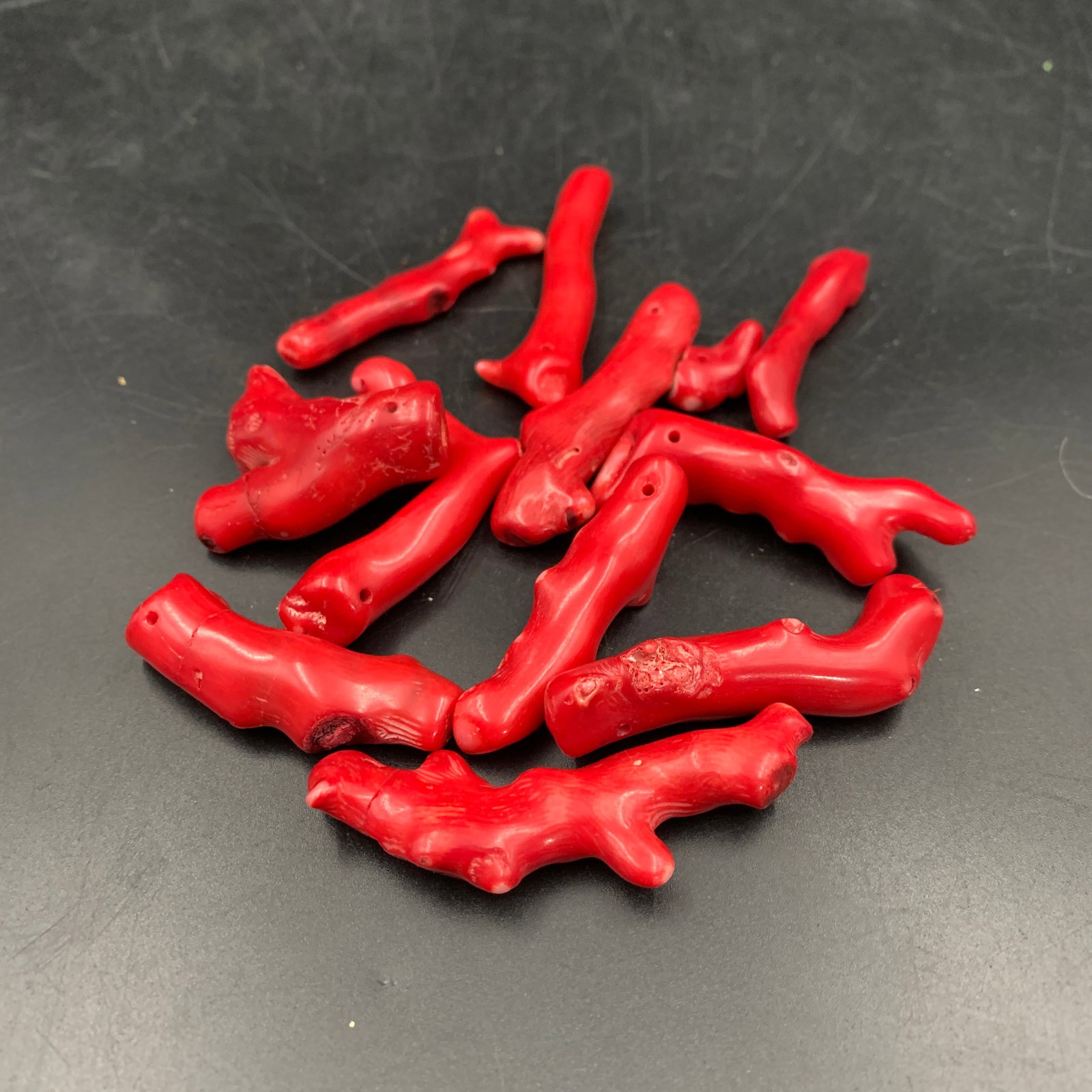 GROUP OF SMALL RED CORAL