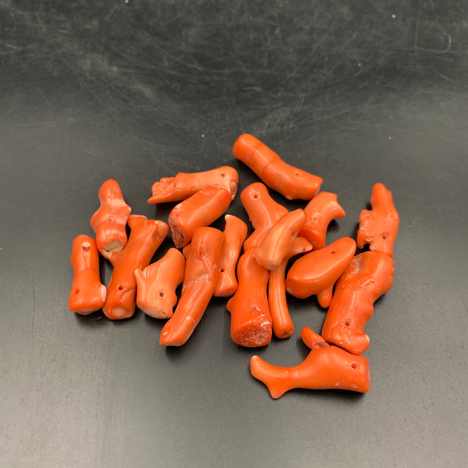 GROUP OF SMALL RED CORAL