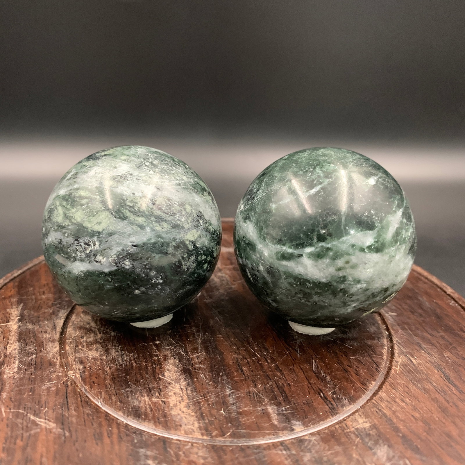 PAIR OF MARBLE MADE HAND PLAYING BALL