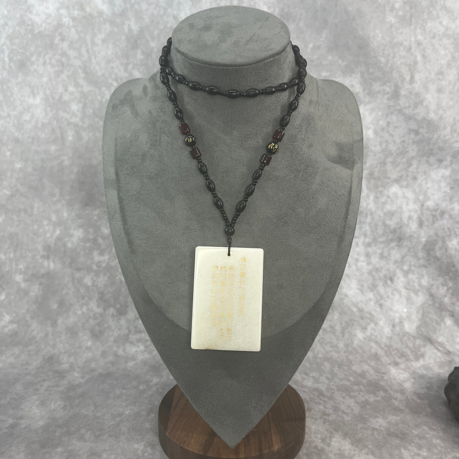 A FINE WHITE JADE DEVOTIONAL PLAQUE NECKLACE: Modern; Long: 2.51 inch; Width: 1.67 inch; High: 0.32 inch