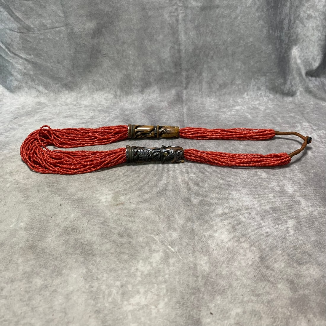 A FINE RED CORAL MADE TIBETAN BUDDIST NECKLACE