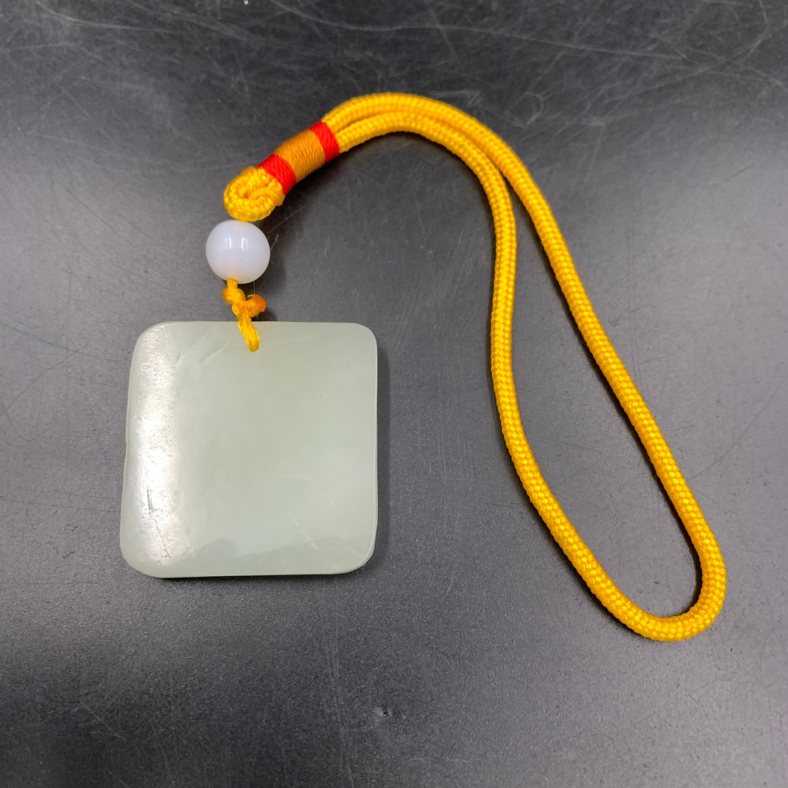 PLAIN WHITE JADEITE "WU SHI PAI" PLAQUE PENDANT