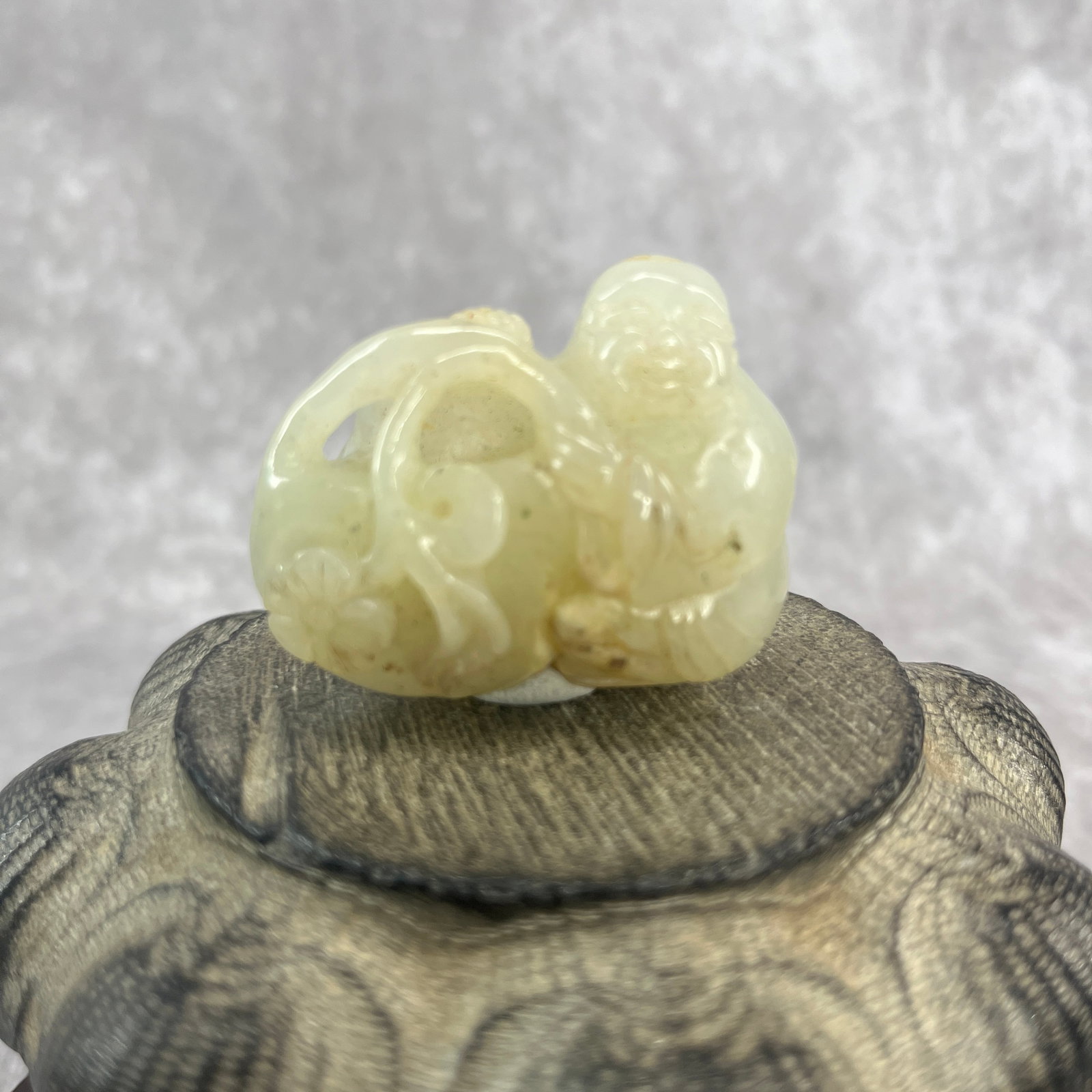 FINE HAND-CARVED JADE FIGURINE OF BOY: Qing Dynasty; Long: 1.94 inch; Width: 1.6 inch; High: 1 inch