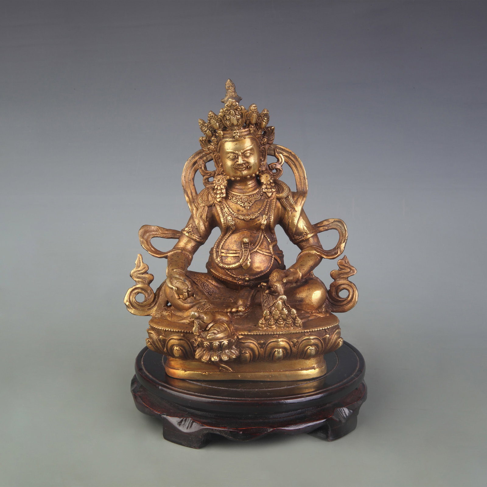 A FINE BRONZE YELLOW GOD OF WEALTH STATUE: Qing Dynasty; High: 8.0 inch; Wooden base for diplay only