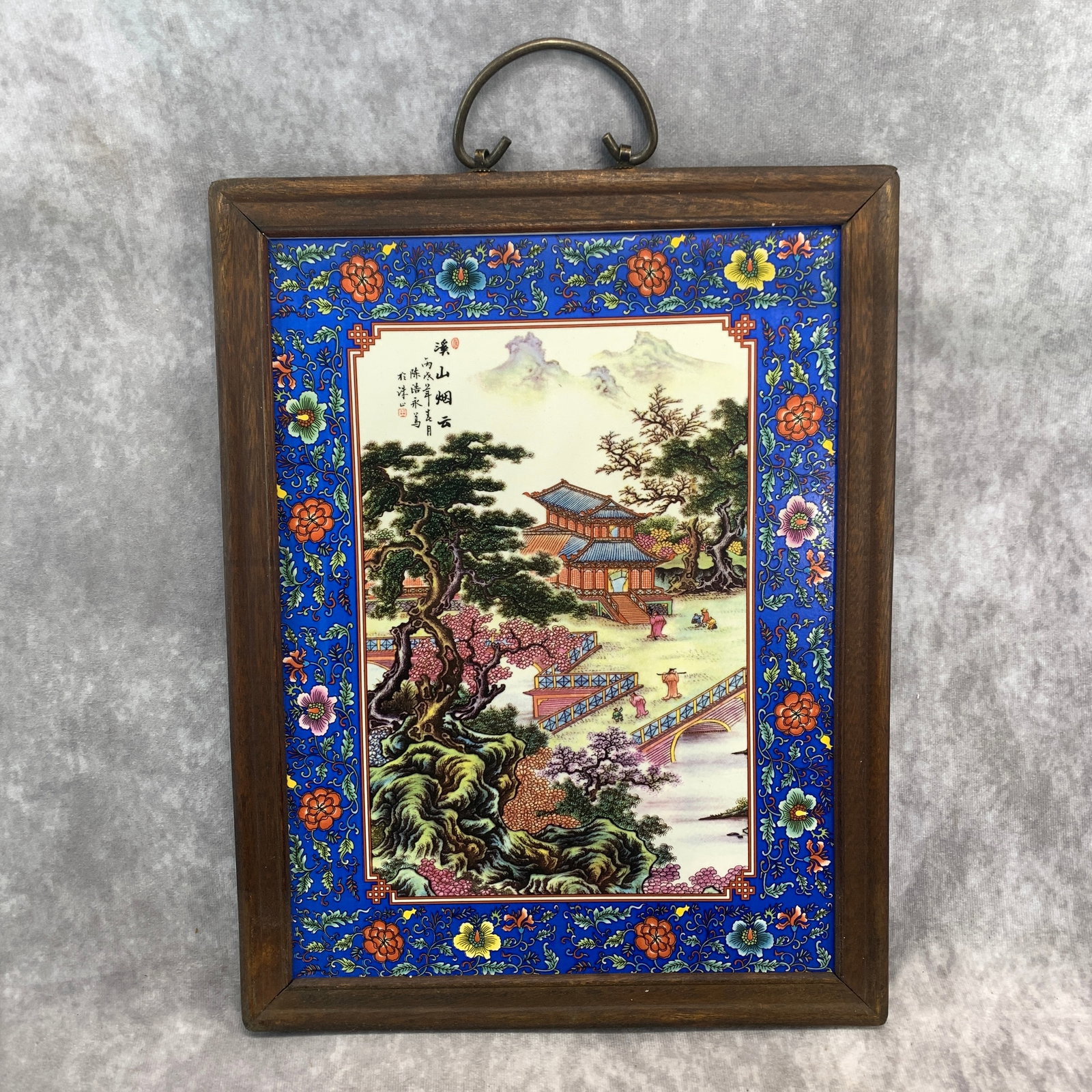 A FRAMED CLOUDS AND MOUNTAINS PATTERN PORCELAIN PLAQUE PANEL