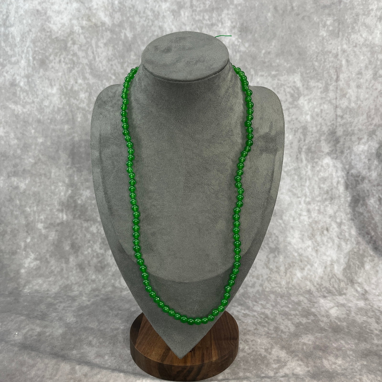 A FINE JADE BEAD MADE NECKLACE