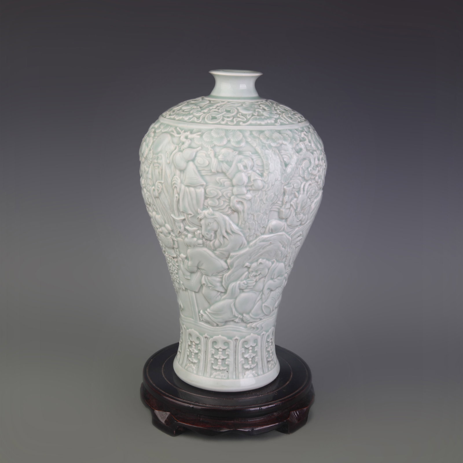 A FINE BLUE GLAZE CARVED FIGURE PATTERN PLUM STYLE PORCELAIN VASE