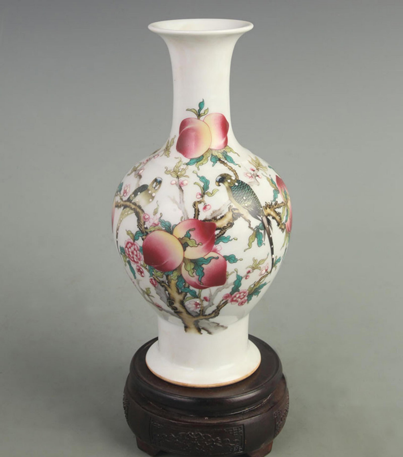 CLOISONNE ENAMEL FLOWER AND BIRD PATTERN PORCELAIN VASE: Qing Dynasty Qian Long Period; High: 9.00 inch; Width: 4.50 inch; Wooden base for diplay only