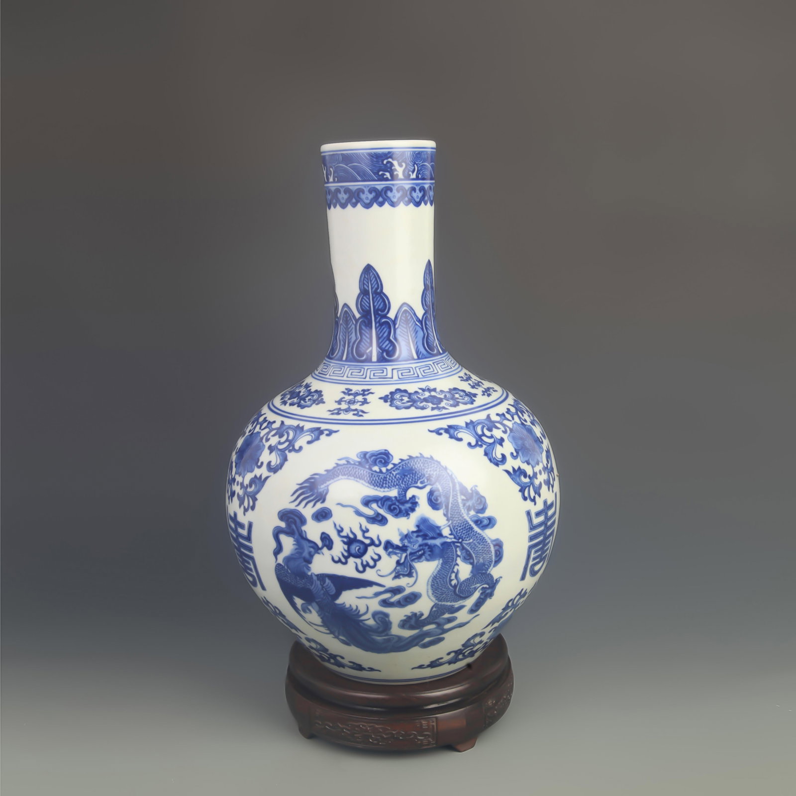 BLUE AND WHITE DRAGON PATTERNED CELESTIAL GLOBE PORCELAIN VASE: Qing Dynasty Qian Long Period; High:14.0 inch; Diameter: 8.20 inch; Wooden base for diplay only