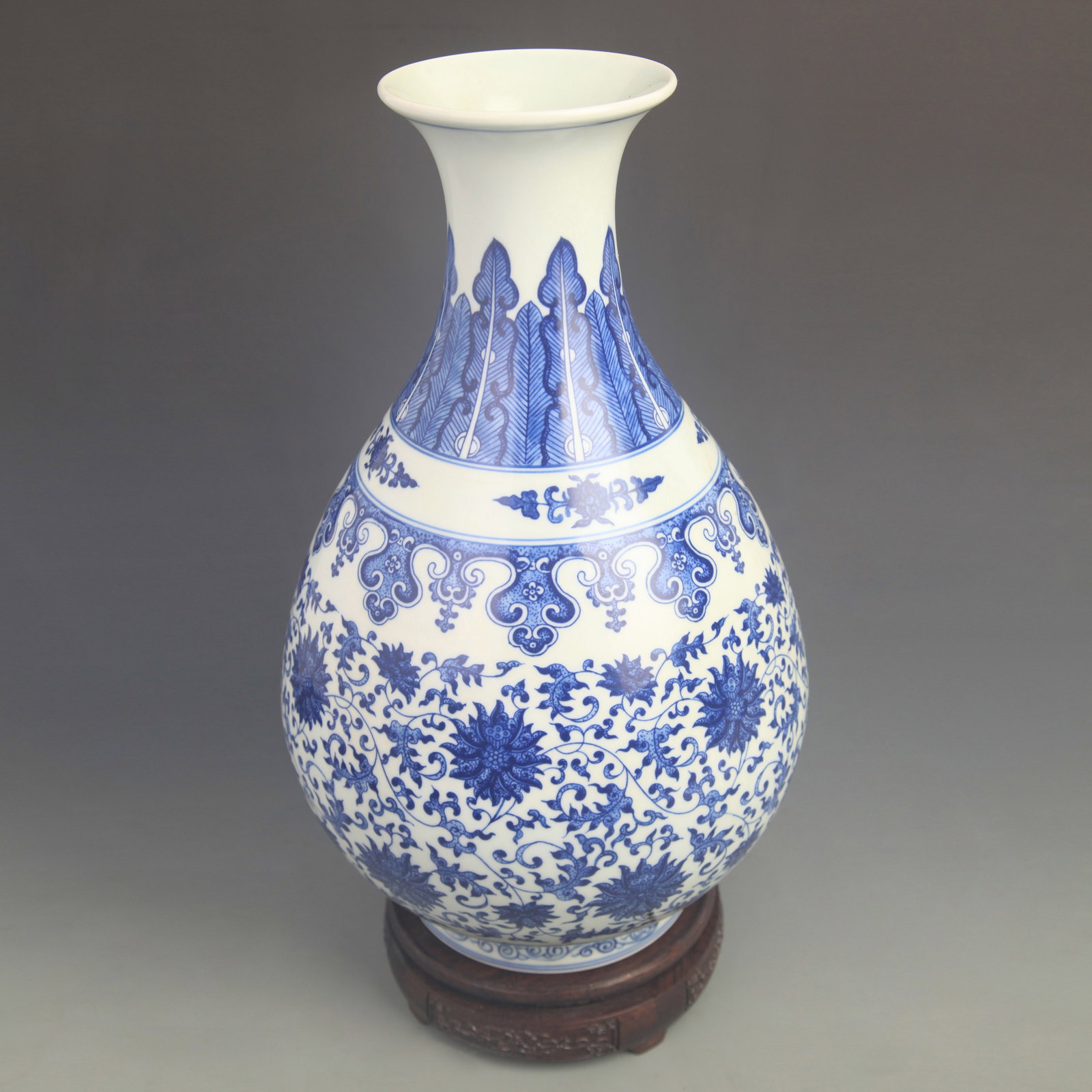 BLUE AND WHITE LOTUS SCROLL YUHUCHUN PORCELAIN VASE: Qing Dynasty Qian Long Period; High: 15.0 inch;Diameter: 8.50 inch; Wooden base for diplay only