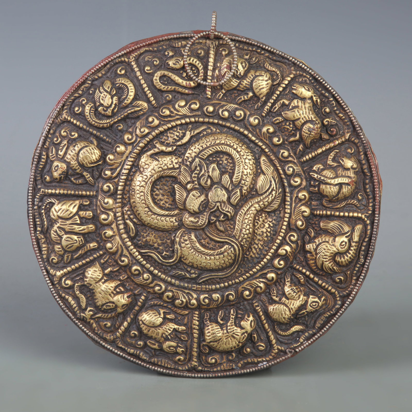 A FINE BRONZE TIBETAN TWELVE ZODIAC ANIMAL DESIGN MELONG
