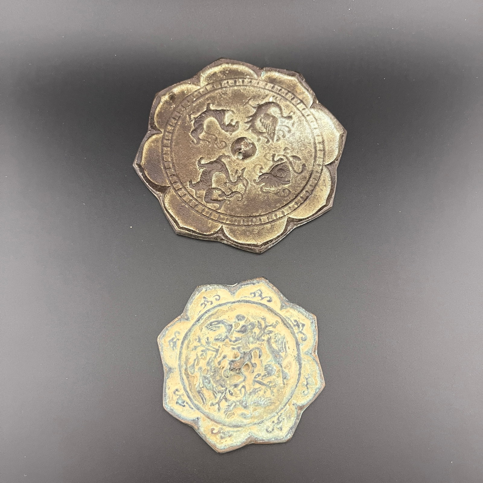 GROUP OF TWO SMALL WATER CHESTNUT FLOWER PATTERN BRONZE MIRRORS