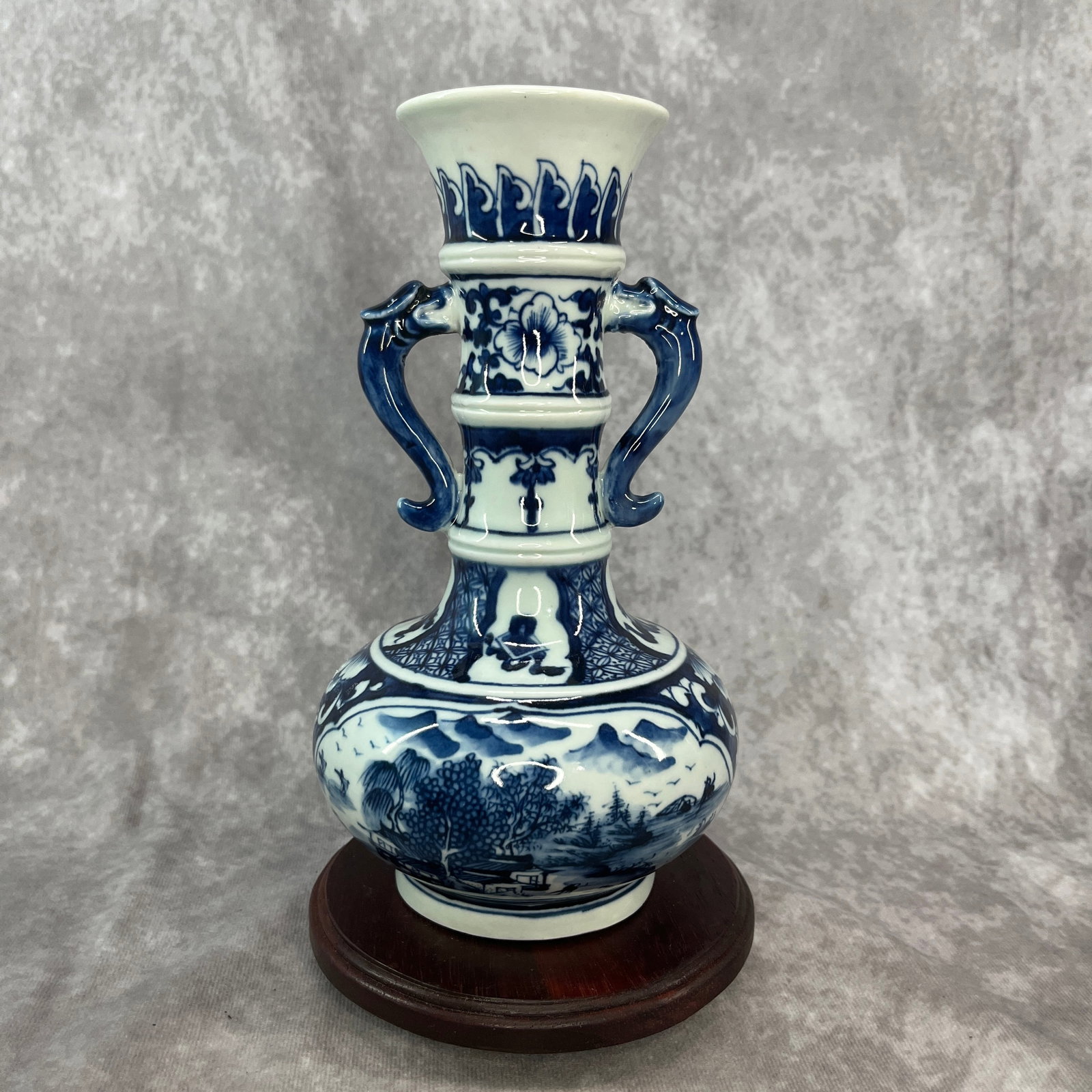 BLUE AND WHITE DRAGON-HANDLED RIBBED LANDSCAPE VASE