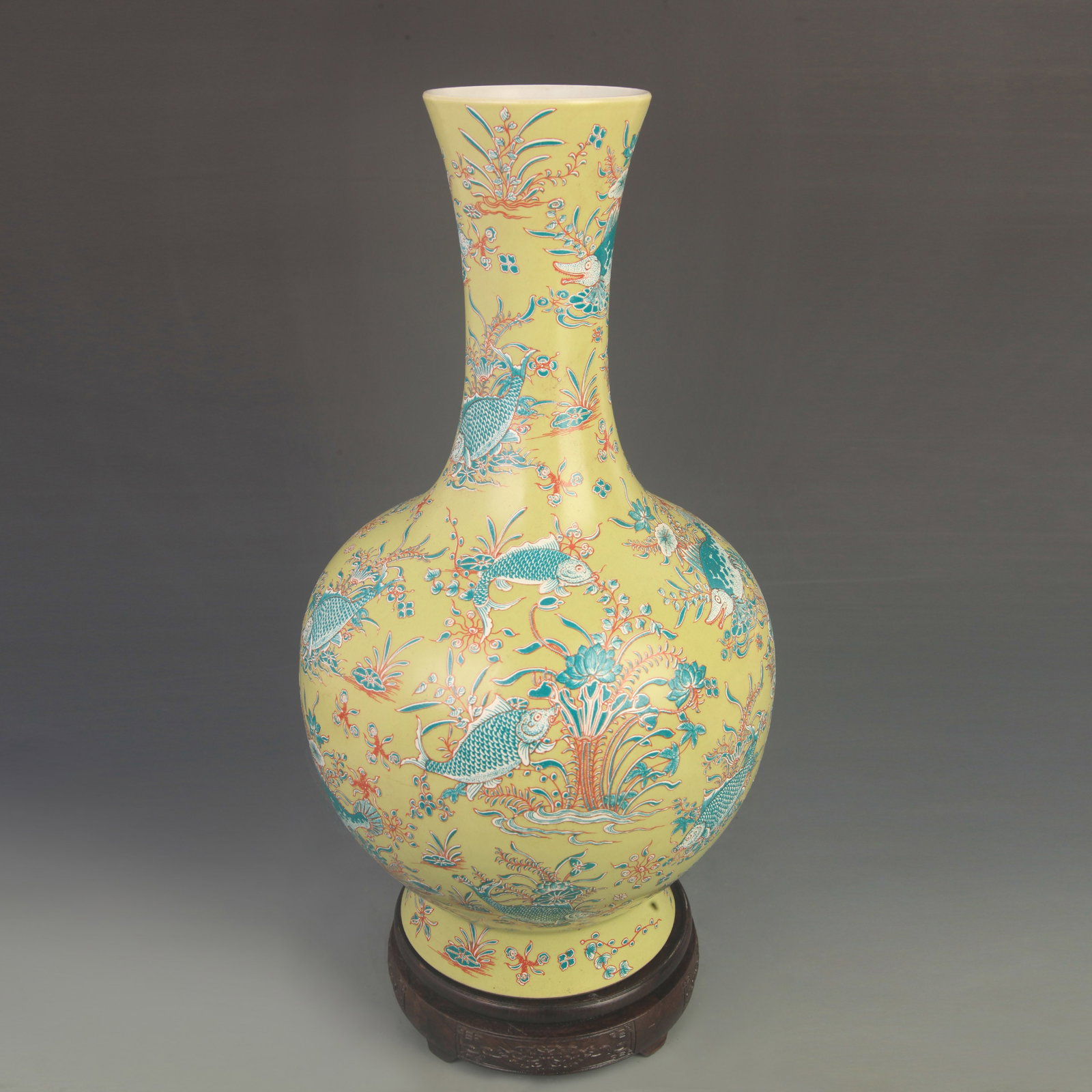 FAMILLE-ROSE YELLOW GROUND FISH CELESTIAL GLOBE STYLE PORCELAIN VASE
