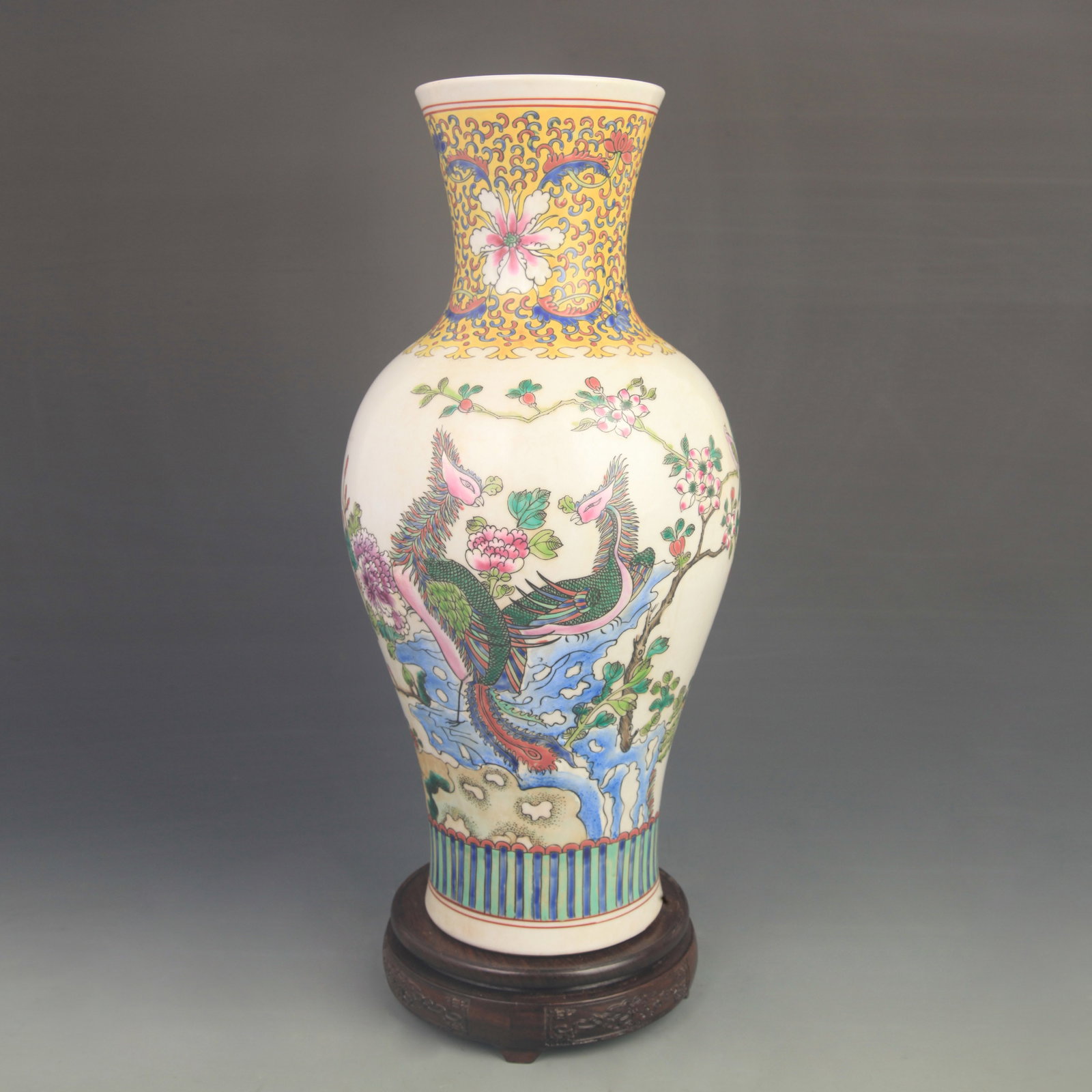 FAMILLE ROSE PORCELAIN VASE WITH PHOENIX PATTERNS: Qing Dynasty Yong Zheng Period; High: 16.8 inch; Diameter: 7.30 inch; Wooden base for diplay only