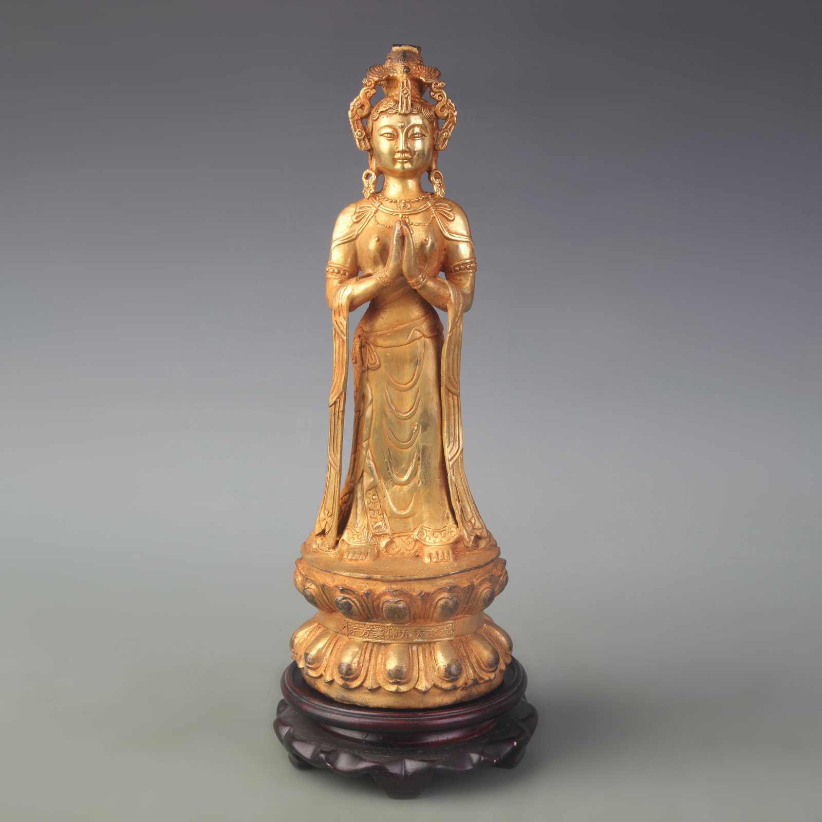 A FINE GILT BRONZE FIGURE OF AVALOKITESHVARA GUAN YIN: Qing Dynasty; High: 12.0 inch; Wooden base for diplay only