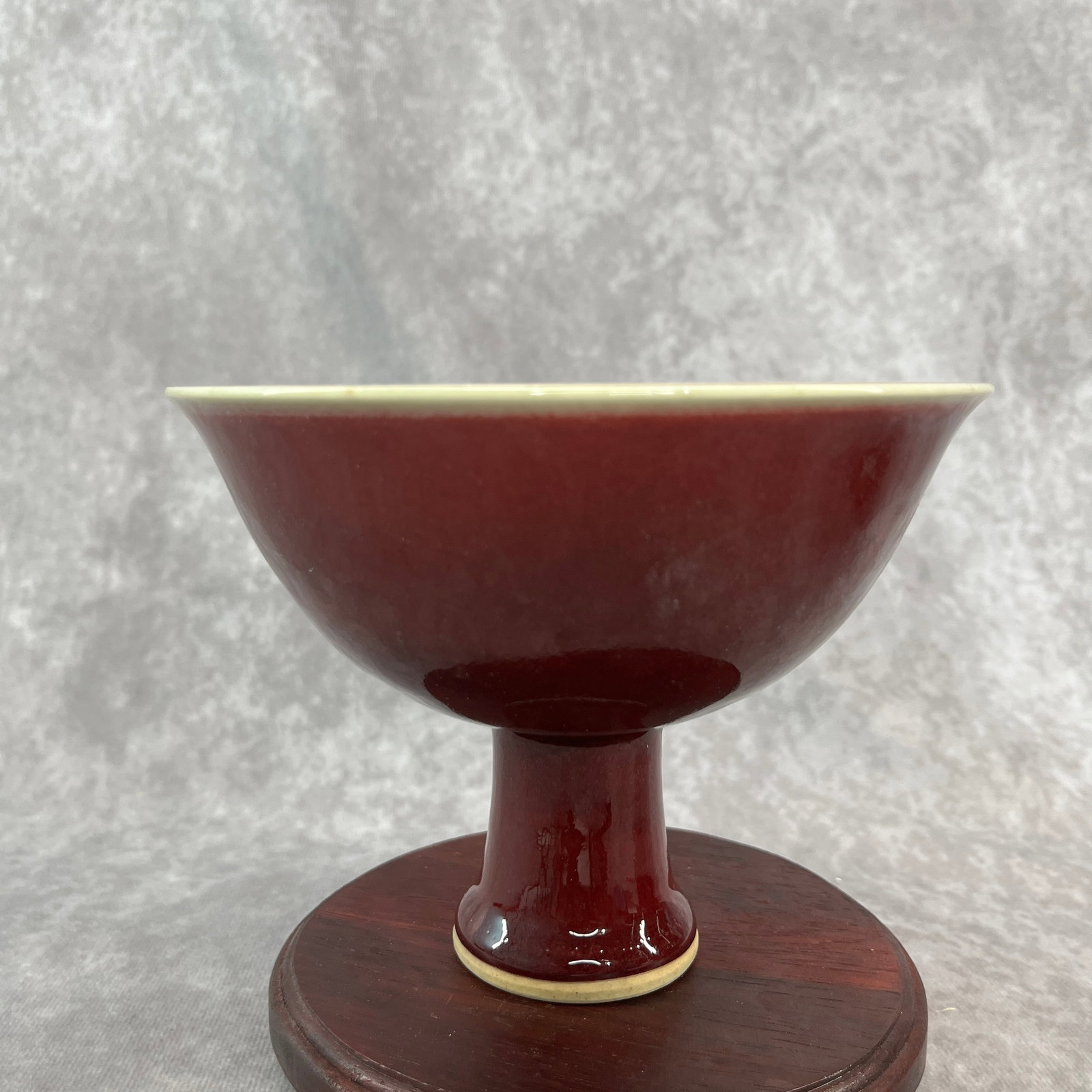 A FINE SACRIFICIAL-RED GLAZED STEM PORCELAIN BOWL: Ming Dynasty Style; High: 4.6 inch; Diameter: 6 inch; Wooden base for diplay only