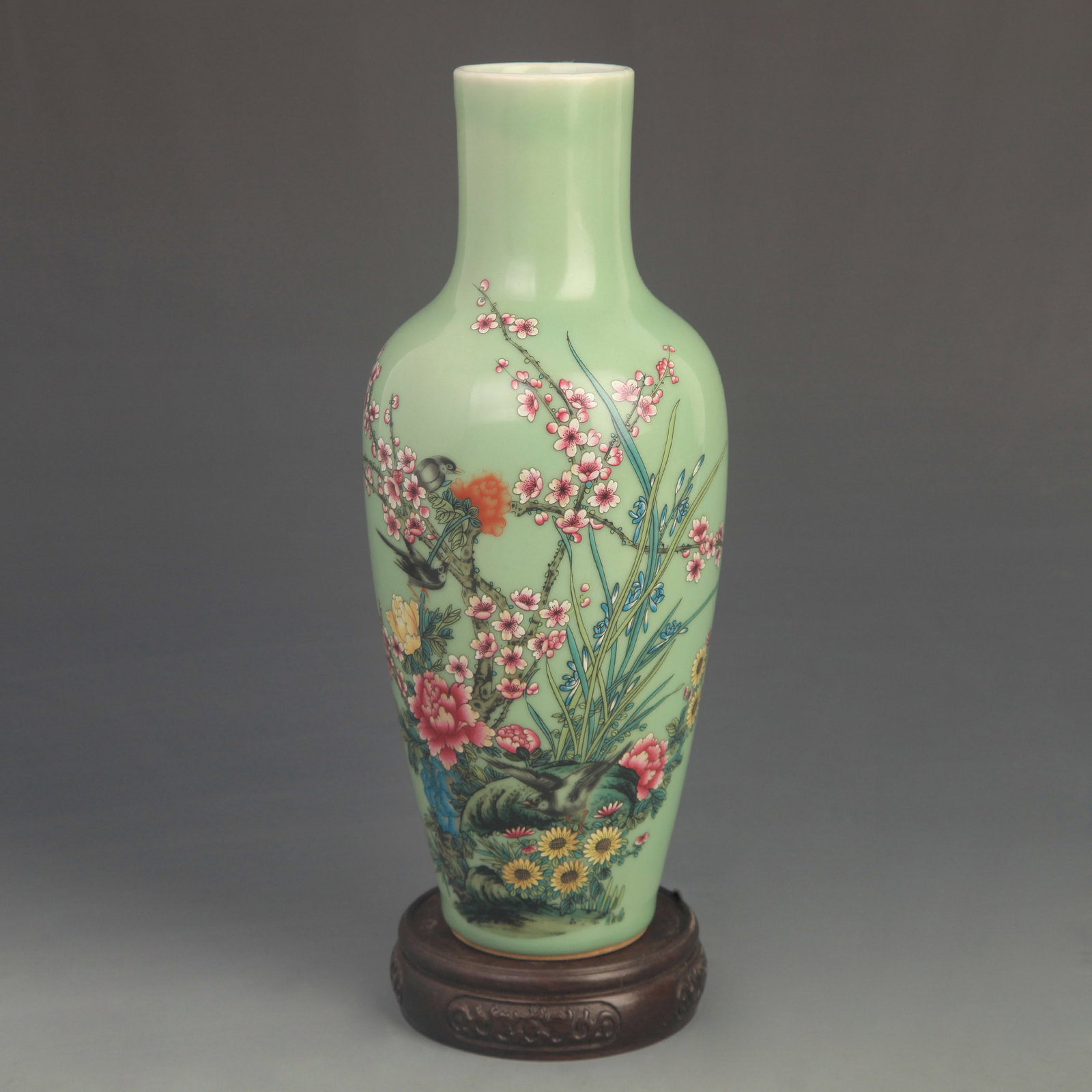 FAMILLE ROSE LIGHT GREEN FLOWER BIRD STRAIGHT NECK PORCELAIN VASE: Qing Dynasty Qian Long Period; High: 10.5 inch; Diameter: 4.00 inch; Wooden base for diplay only