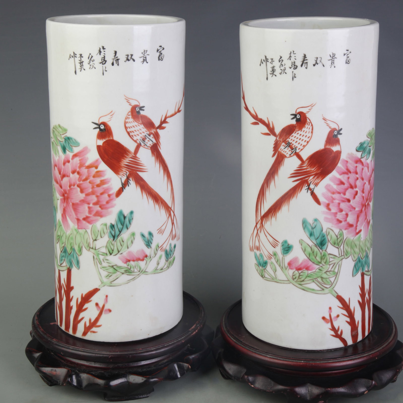 PAIR OF FAMILLE ROSE HAT STANDS WITH FLORAL AND BIRD PATTERNS