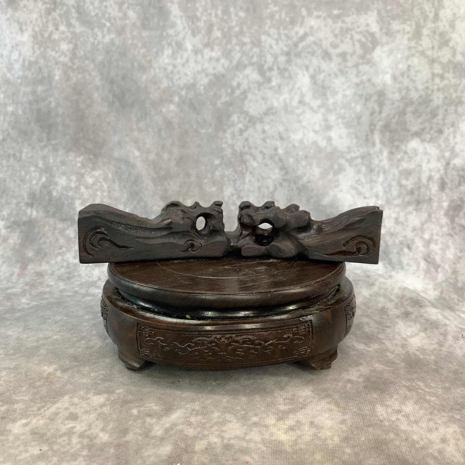 A CARVED DARK HARDWOOD OPENWORK 'LINGZHI' PEN REST (BIJIAG): Modern; Long: 7.5 inch; Width: 1.8 inch; High: 1.3 inch; Wooden base for diplay only