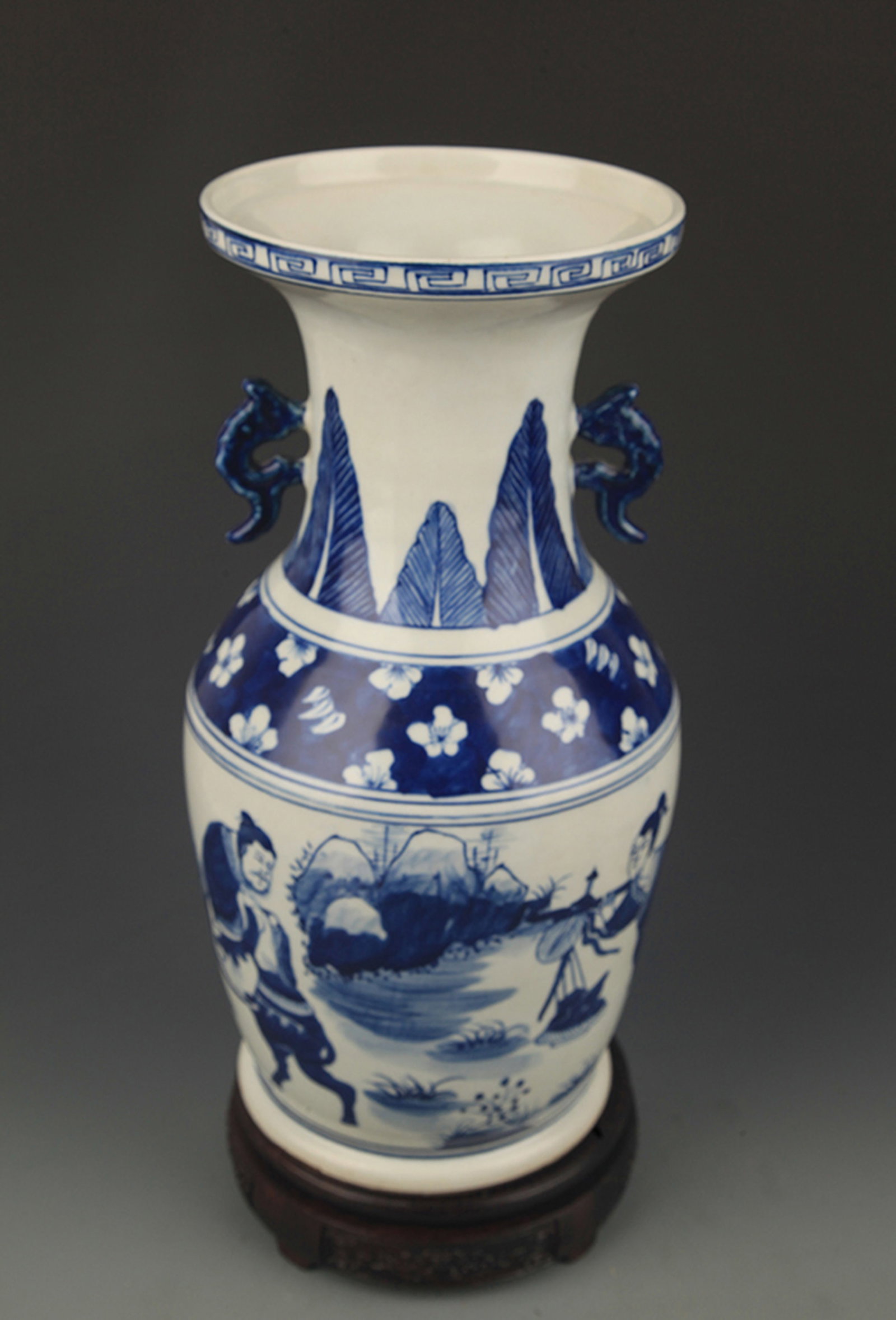 A BLUE-AND-WHITE FIGURAL DOUBLE-HANDLED PORCELAIN VASE