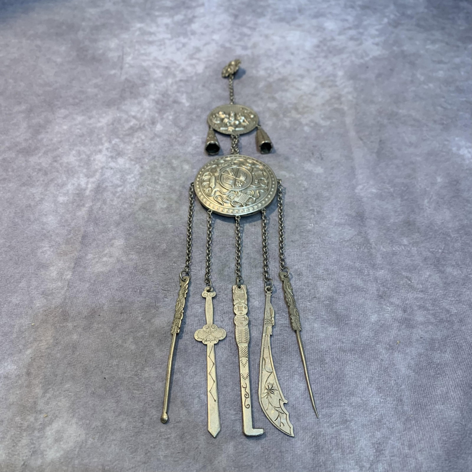 A FINE WHITE BRONZE MADE CHATELAINE (1 of 4)