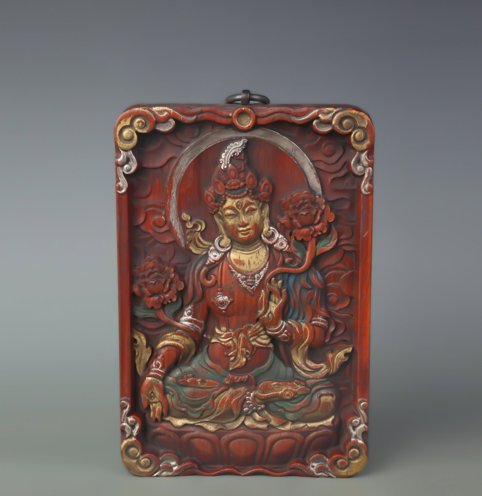A CAMPHOR WOOD CARVED BUDDHIST HANGING PANEL: Qing Dynasty; Long: 8.2 inch; Width: 5.5 inch; Wooden base for diplay only