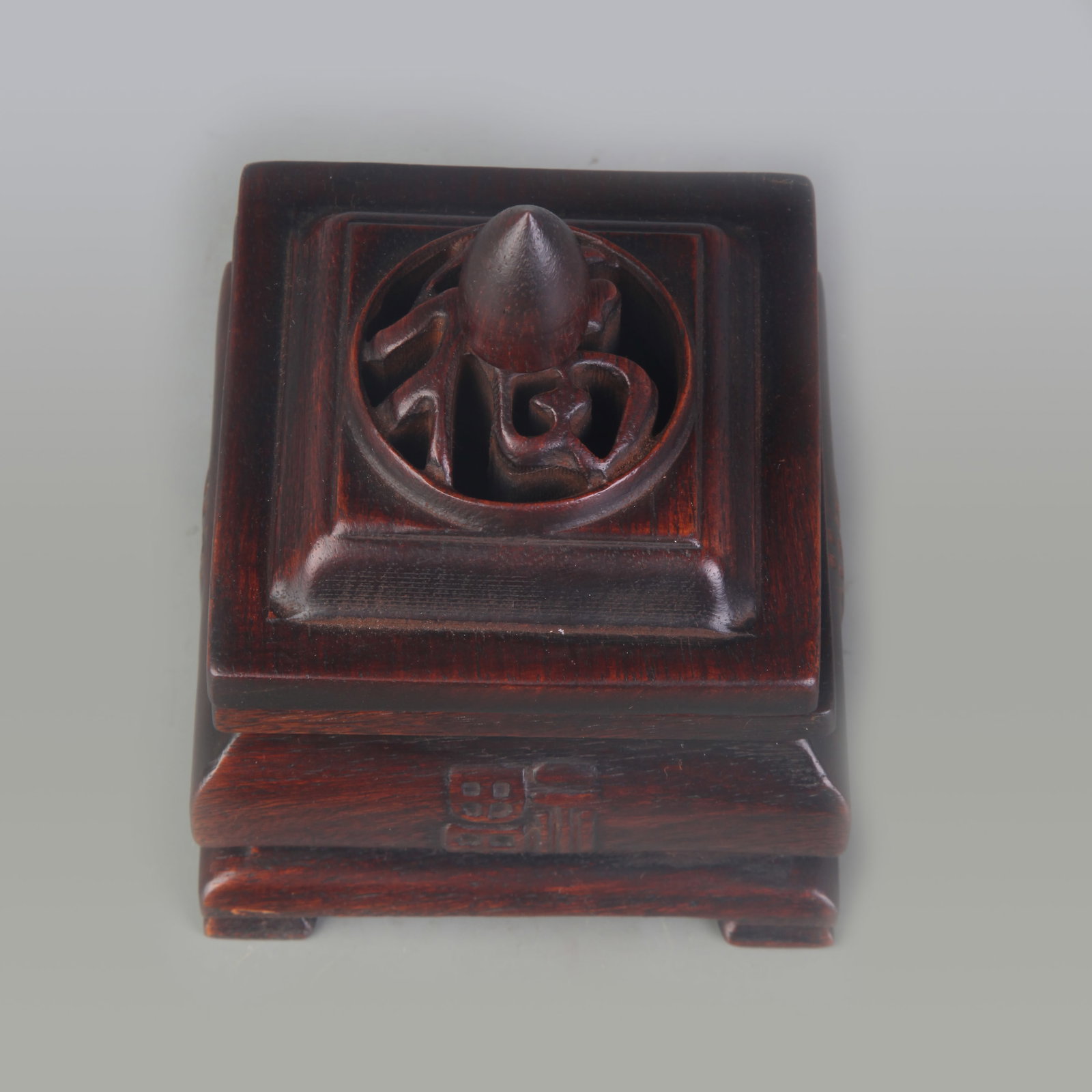 A REDWOOD INCENSE BURNER CARVED WITH THE “FU?? (FORTUNE) CHARACTER: Qing Dynasty; Width: 3.5 inch; High: 4.2 inch; Wooden base for diplay only