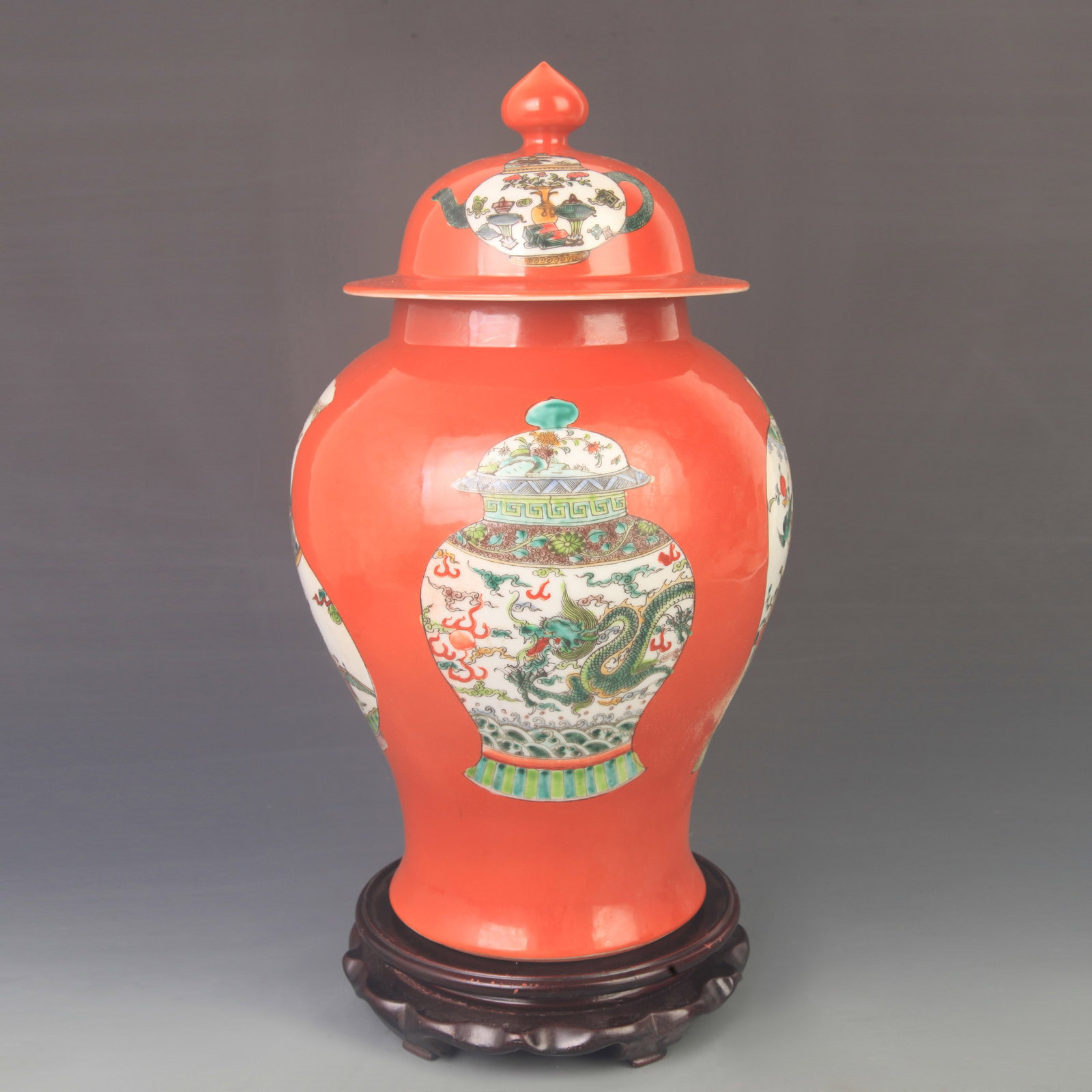 FAMILLE ROSE PORCELAIN VASE WITH IRON-RED GROUND AND RESERVED PANELS: Qing Dynasty Kang Xi Period; High: 16.0 inch; Diameter:8.50 inch; Wooden base for diplay only