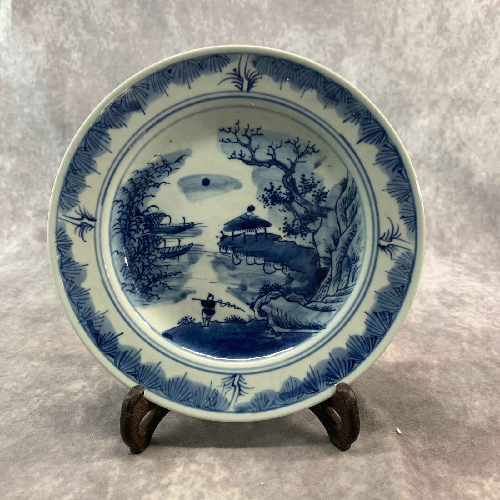 A FINE BLUE AND WHITE LANDSCAPE PORCELAIN PLATE