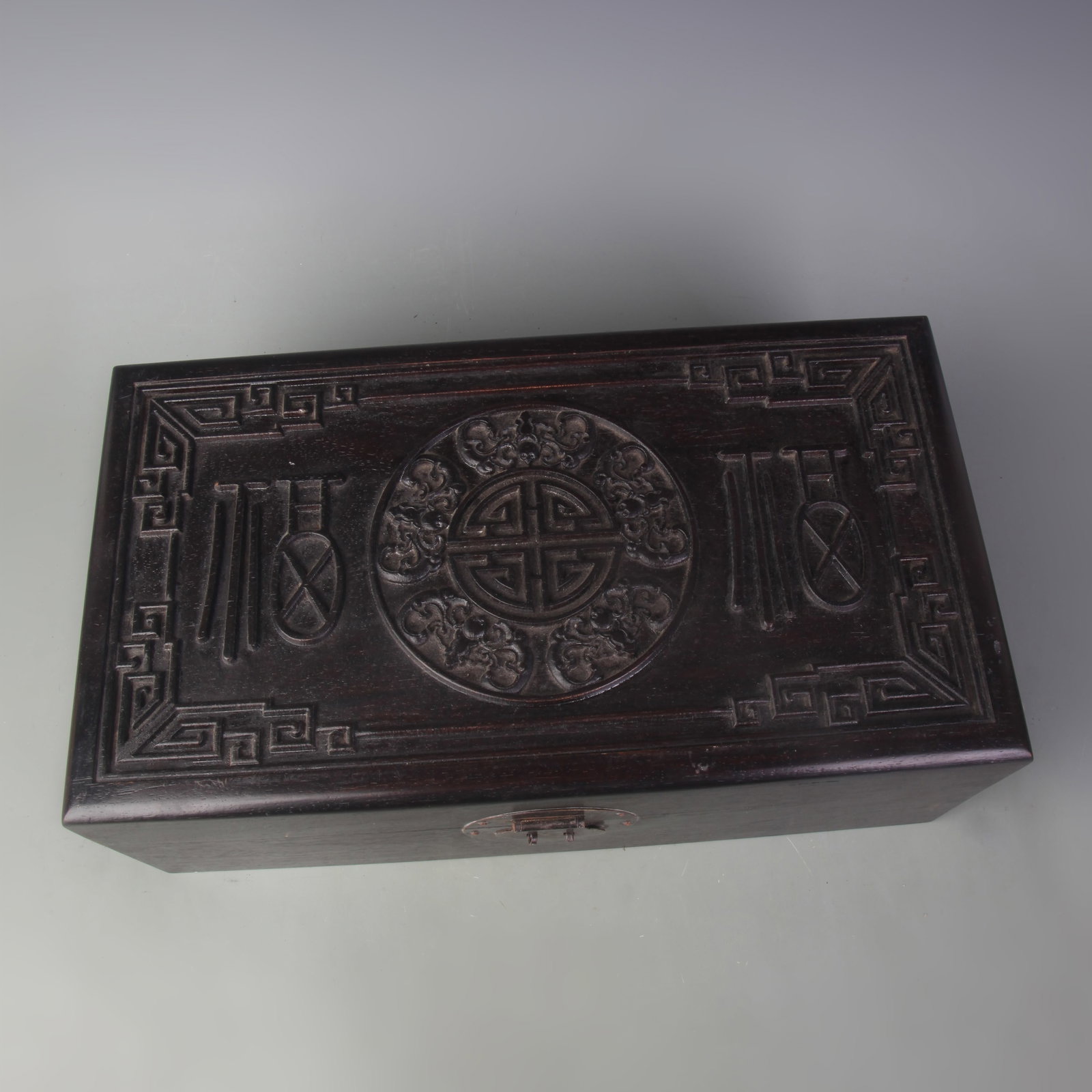 A FINE SANDALWOOD CARVED FU AND SHOU PATTERN WOODEN BOX