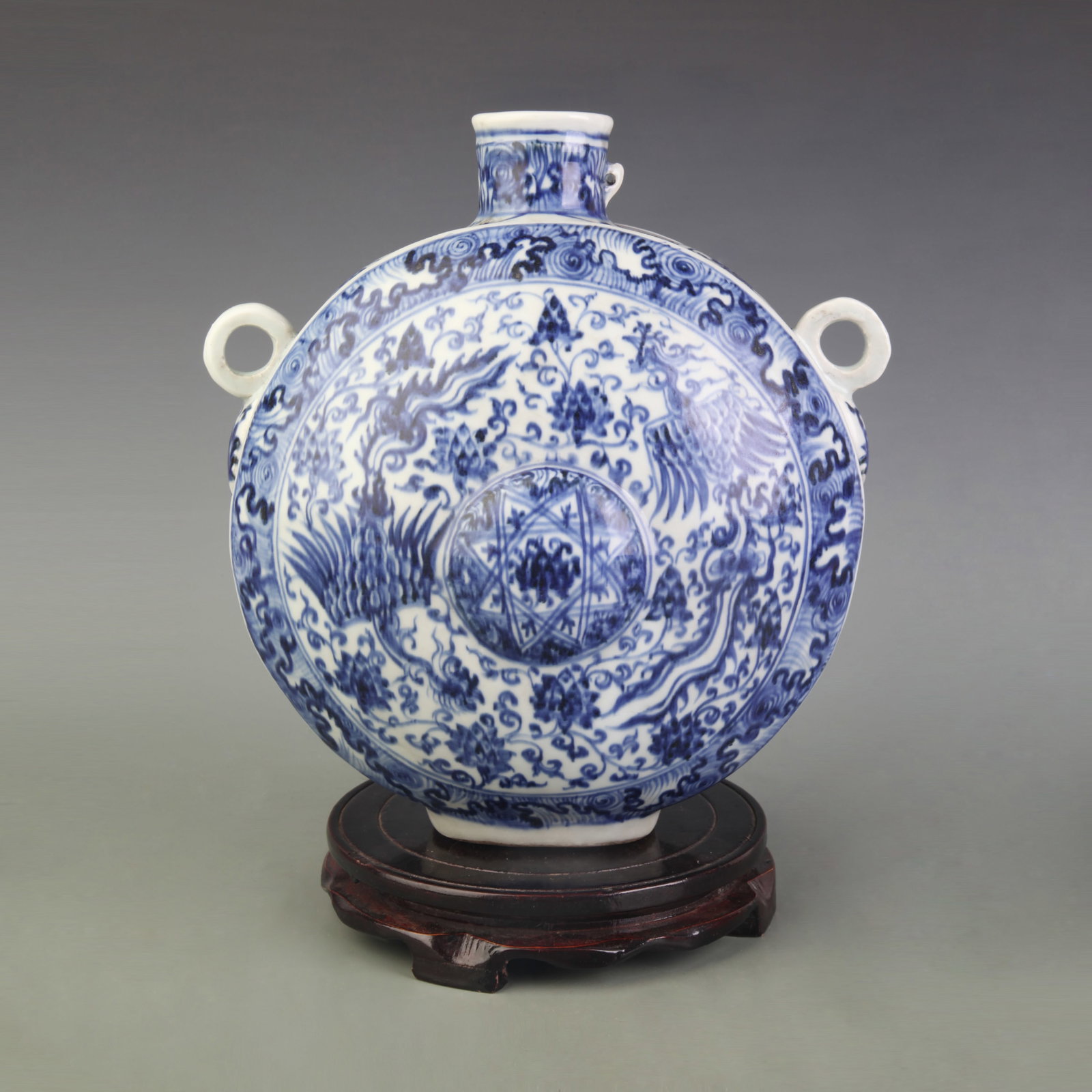 A BLUE AND WHITE PORCELAIN VASE WITH FLORAL AND PHOENIX DECORATION
