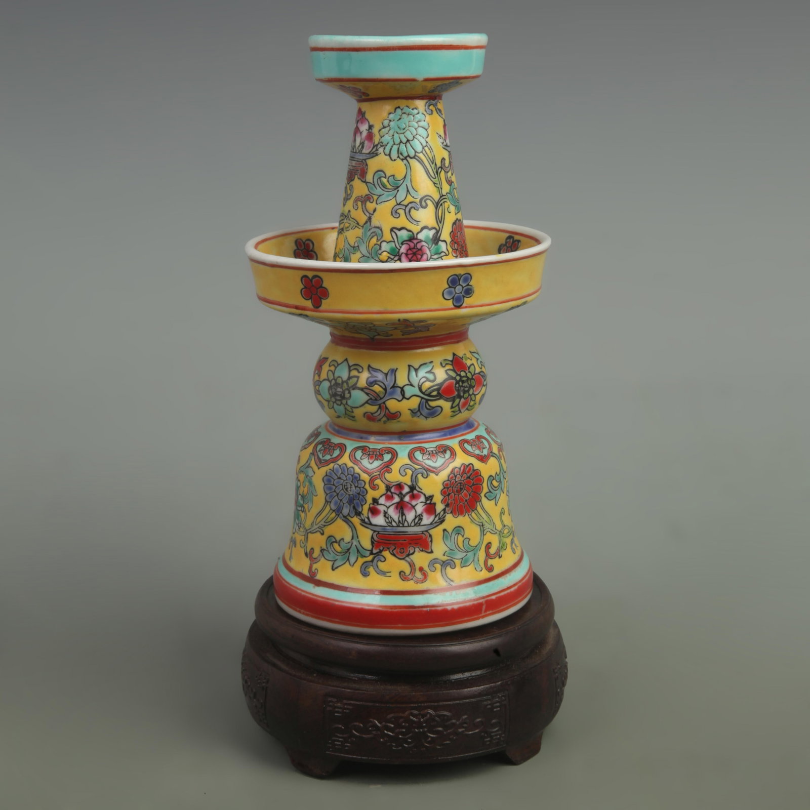 FAMILLE ROSE YELLOW GROUND FLOWER PATTERN CANDLESTICK