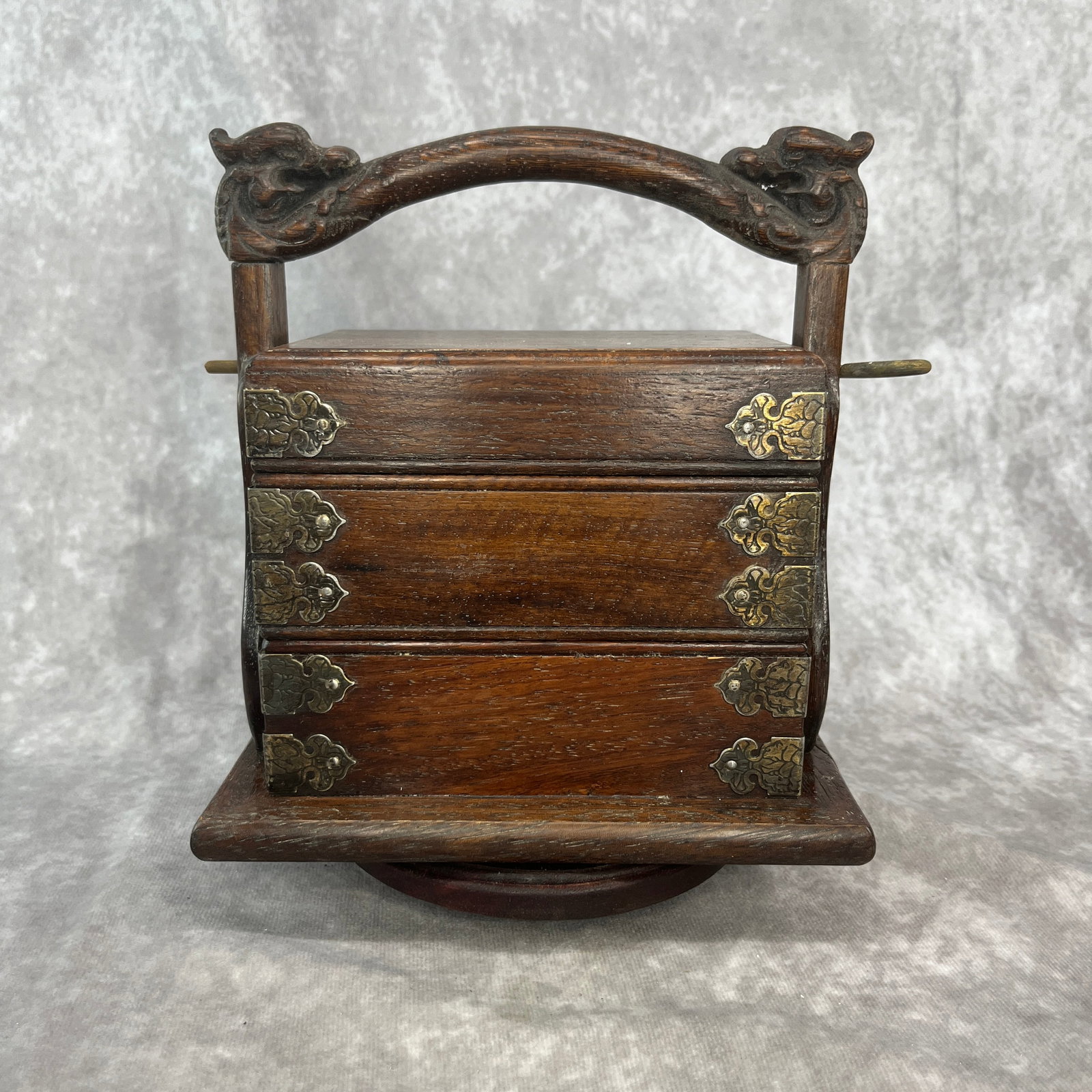 SMALL CARVED HARDWOOD THREE-TIER TRAVELING FOOD BOX