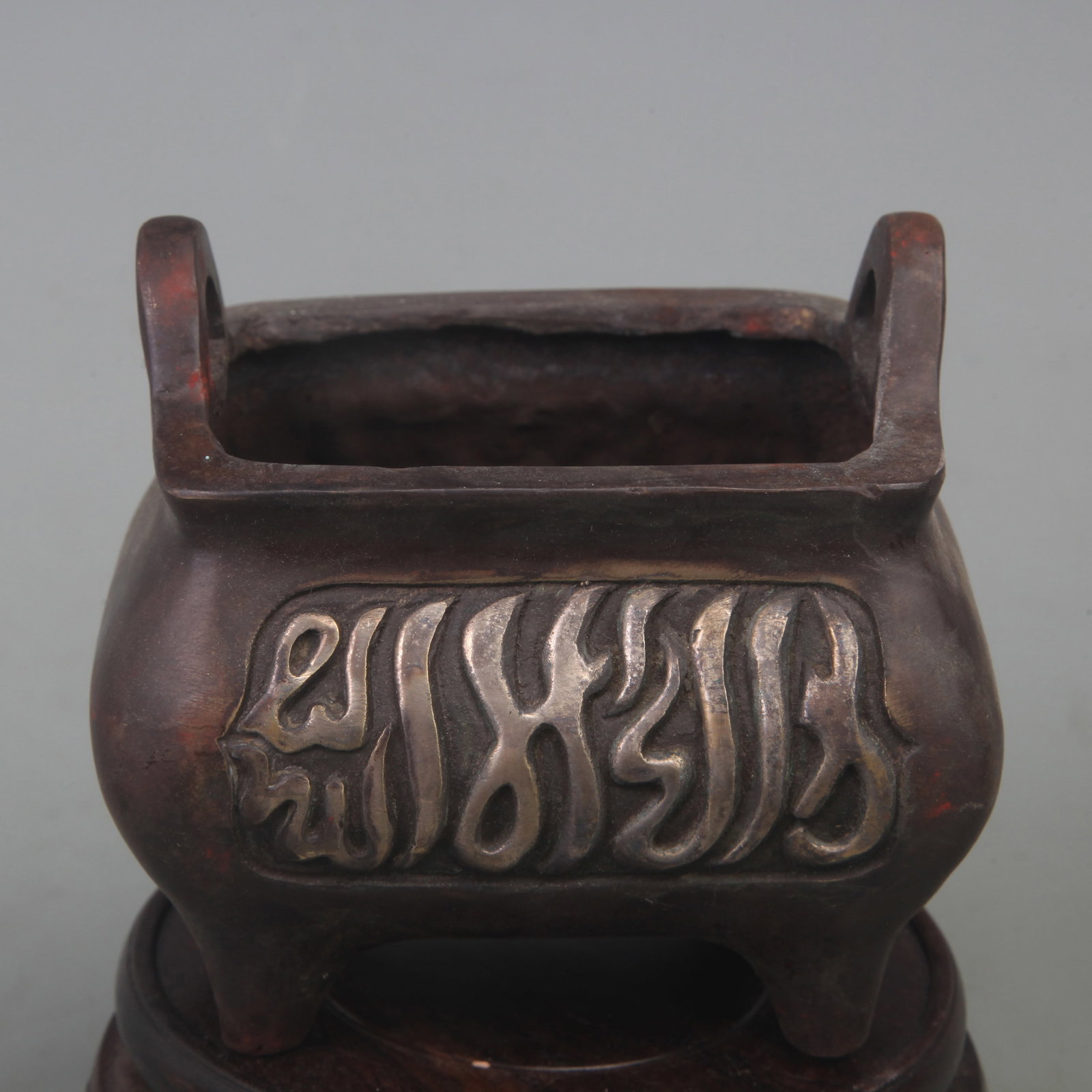 FOUR-SIDED BRONZE CENSER WITH ARCHAIC CARVING
