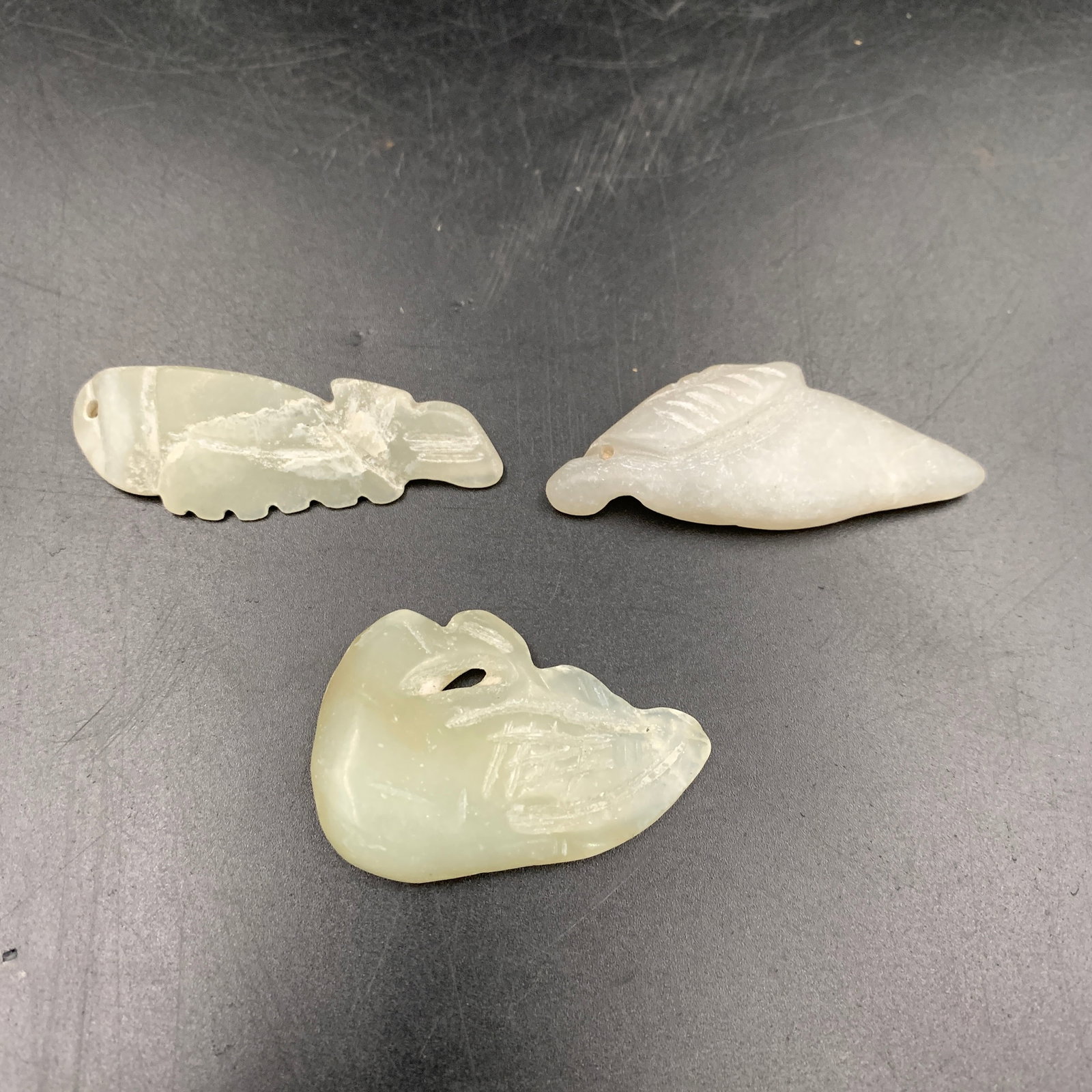 GROUP OF THREE HETIAN JADE PENDANT