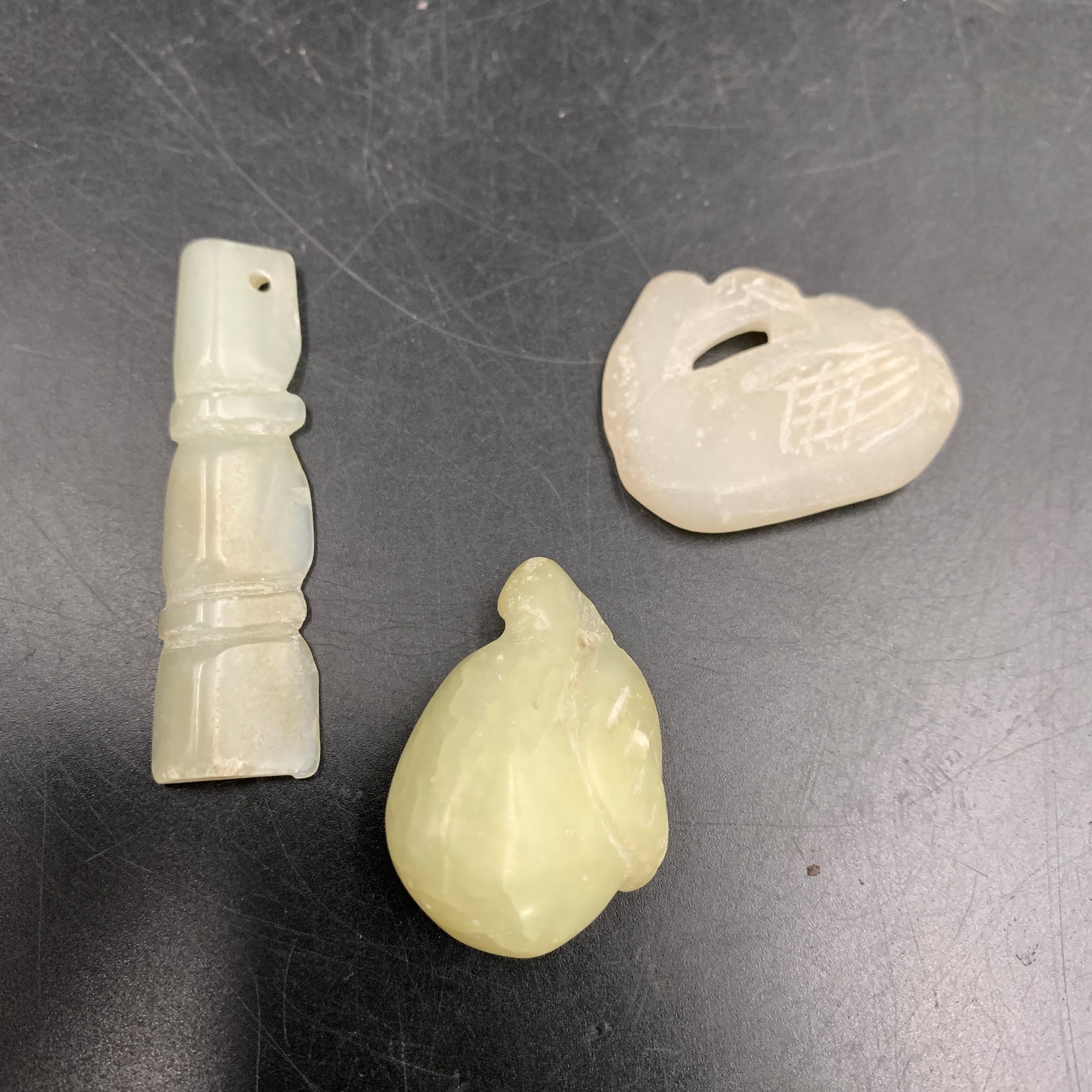 GROUP OF THREE HETIAN JADE PENDANT