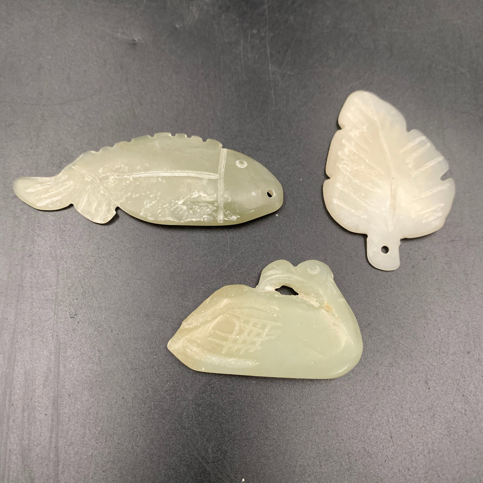 GROUP OF THREE HETIAN JADE PENDANT