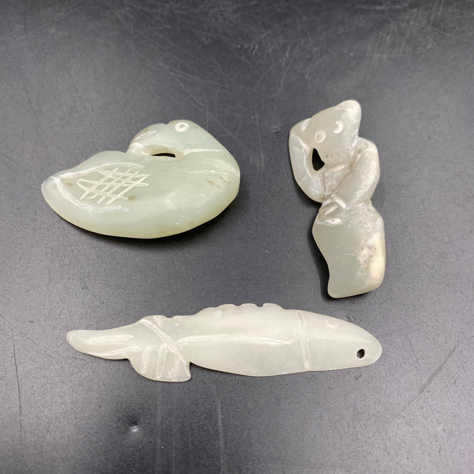 GROUP OF THREE FINELY CARVED HETIAN JADE PENDANT (1 of 4)