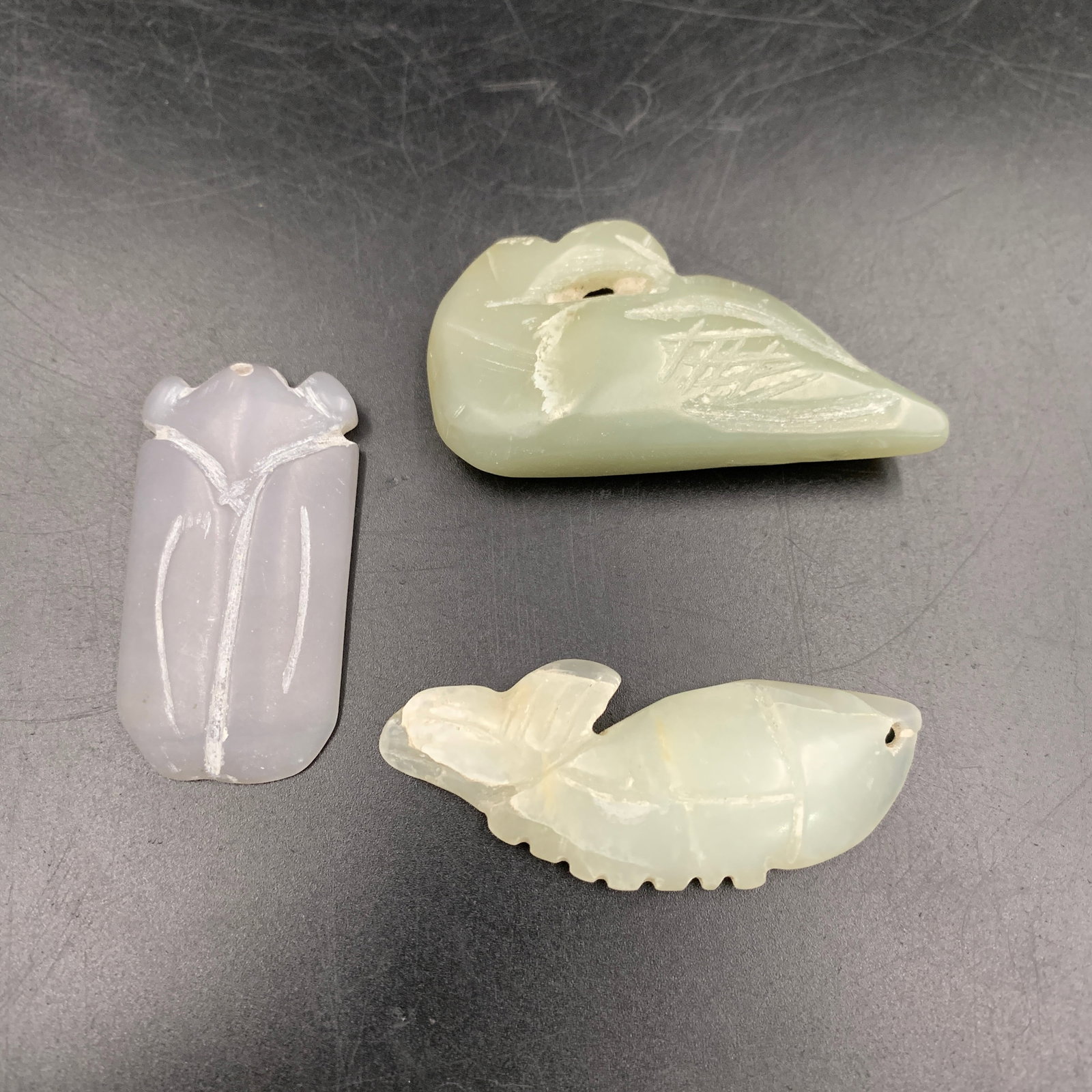 GROUP OF THREE FINELY CARVED HETIAN JADE PENDANT (1 of 4)
