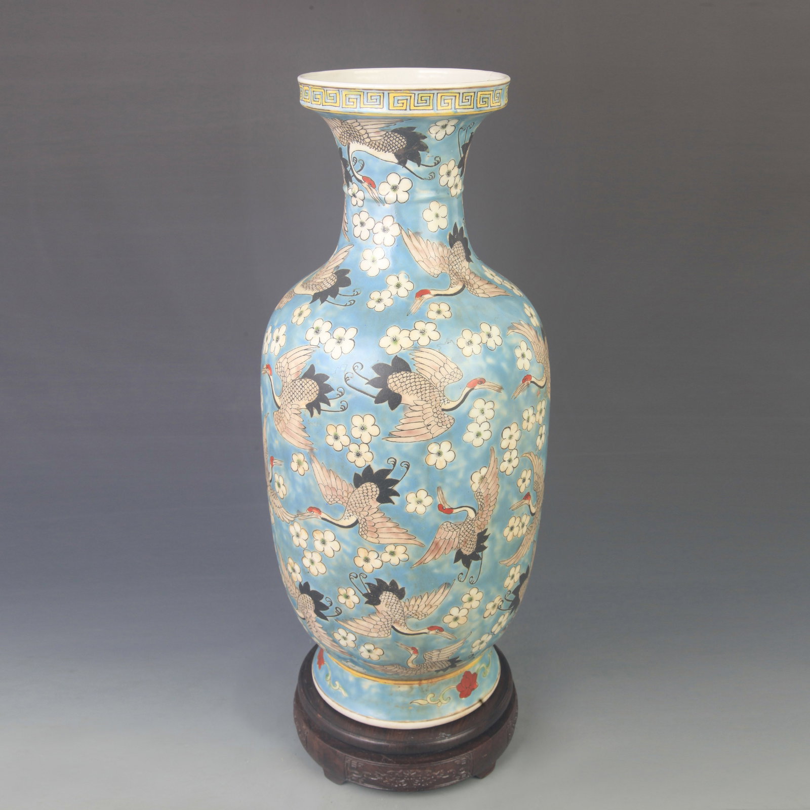 A FAMILLE-ROSE BLUE-GROUND ‘PHOENIX’ PORCELAIN VASE: Qing Dynasty Kang Xi Period; High: 17.0 inch; Diameter: 7.50 inch; Wooden base for diplay only